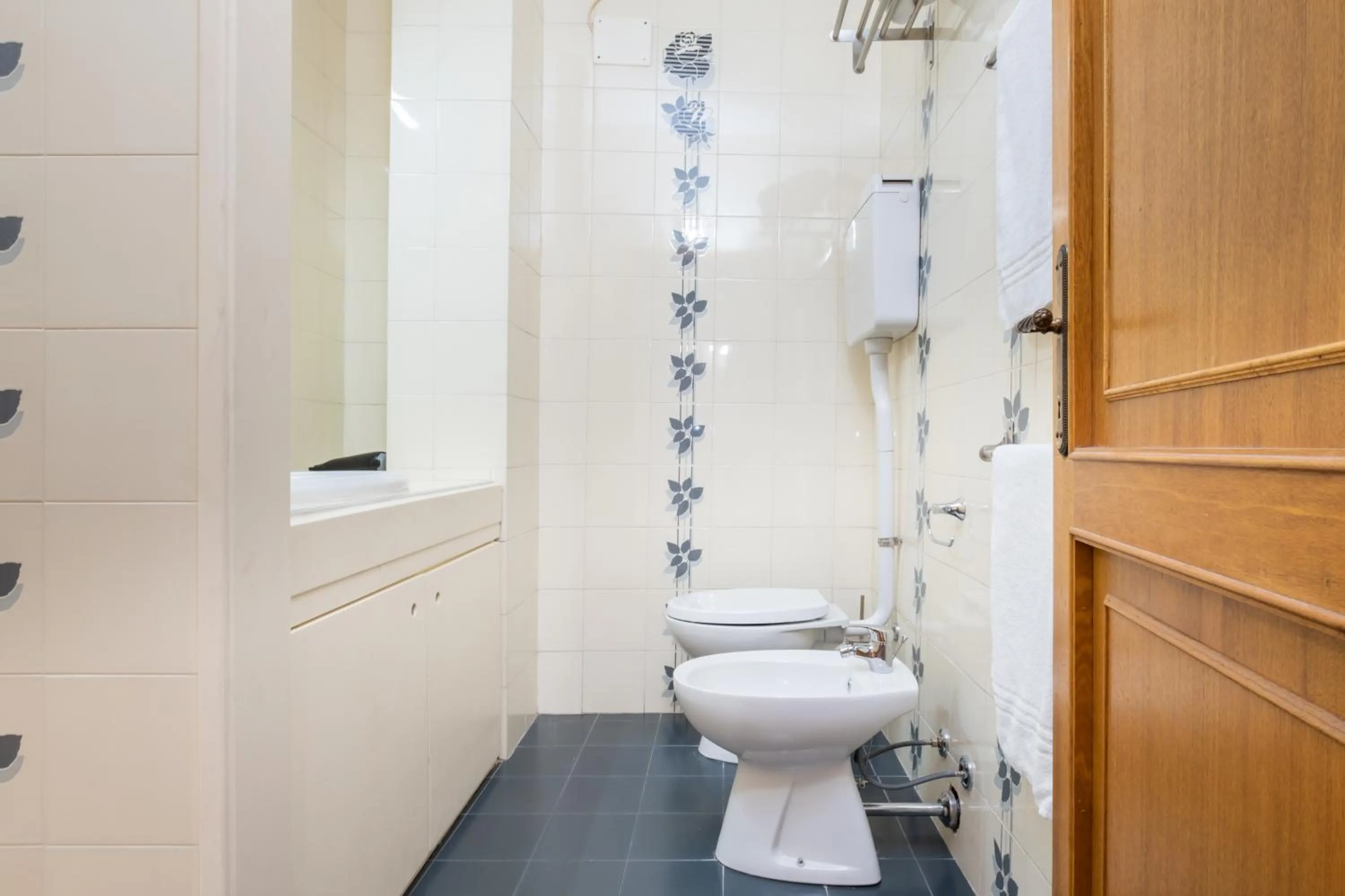 Bathroom in Residenza Ariosto Depandance by Studio Vita