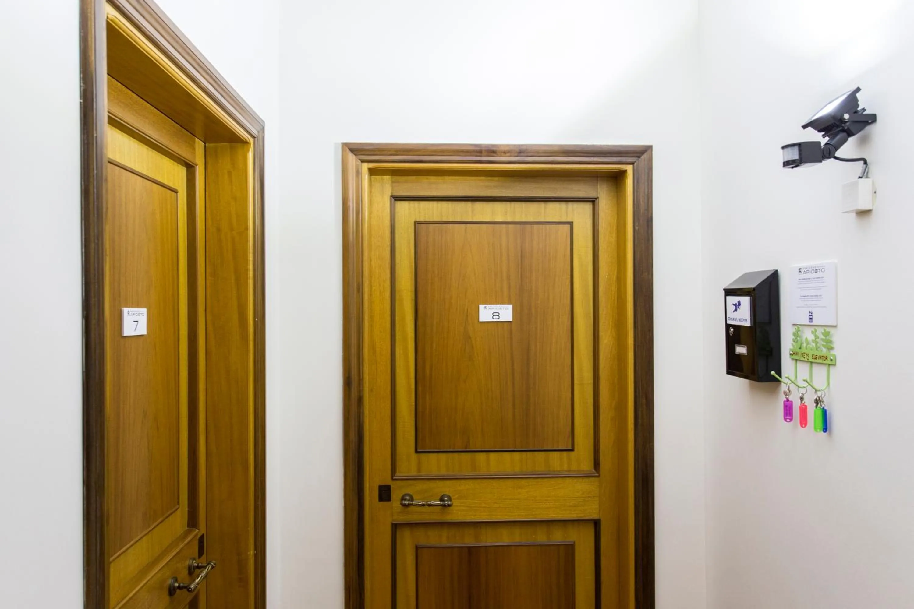 Lobby or reception in Residenza Ariosto Depandance by Studio Vita