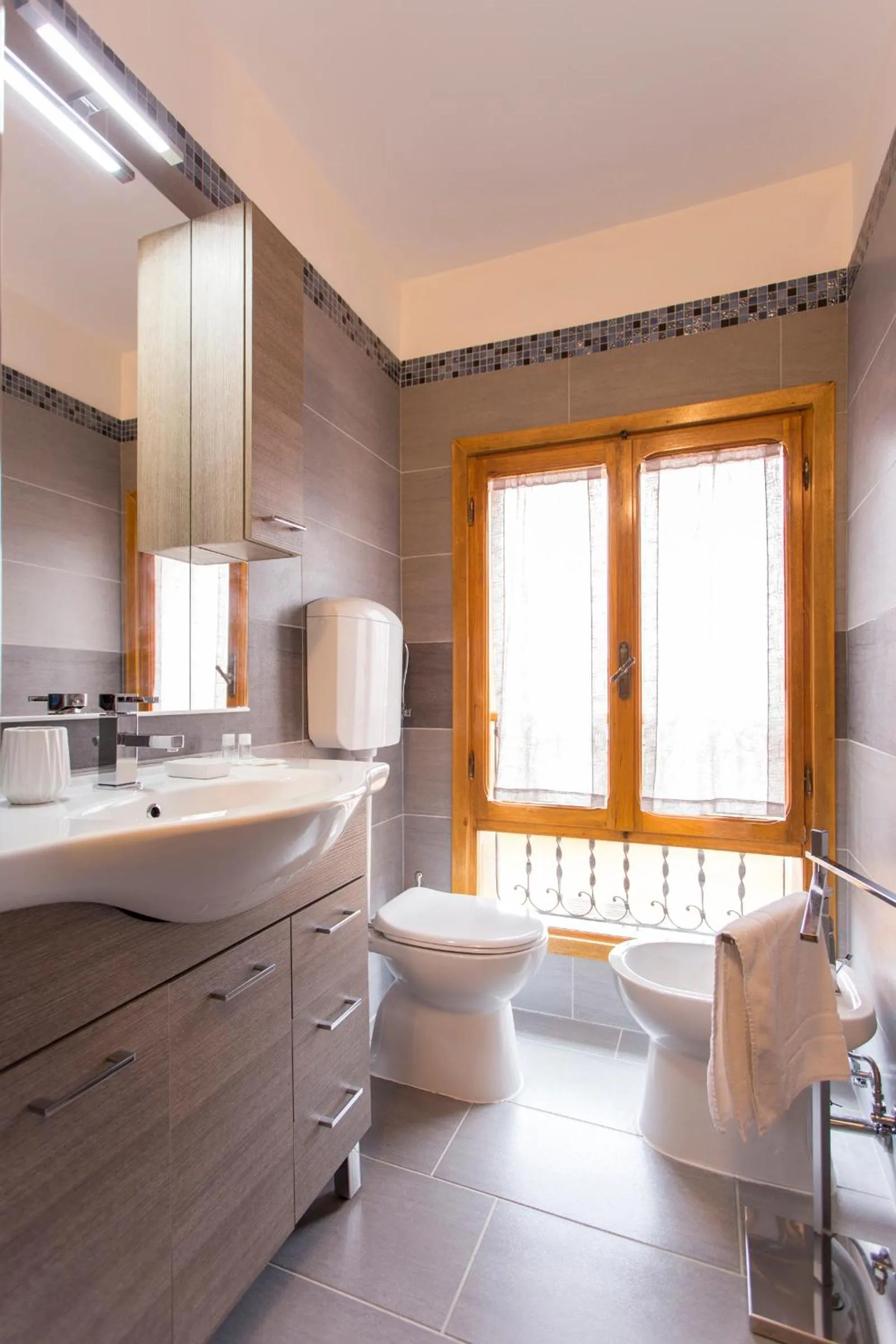 Toilet in Residenza Ariosto Depandance by Studio Vita