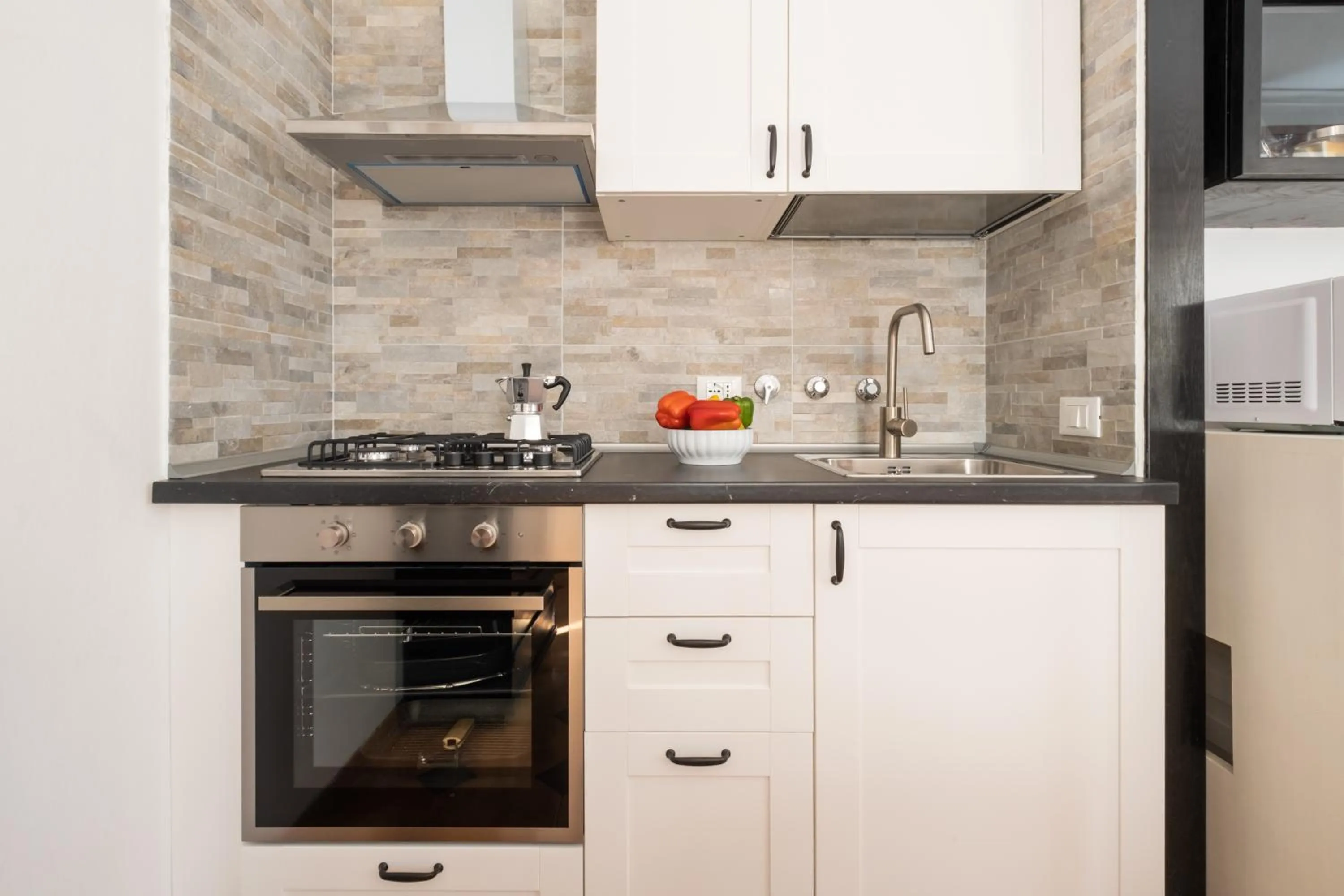 Kitchen or kitchenette in Residenza Ariosto Depandance by Studio Vita