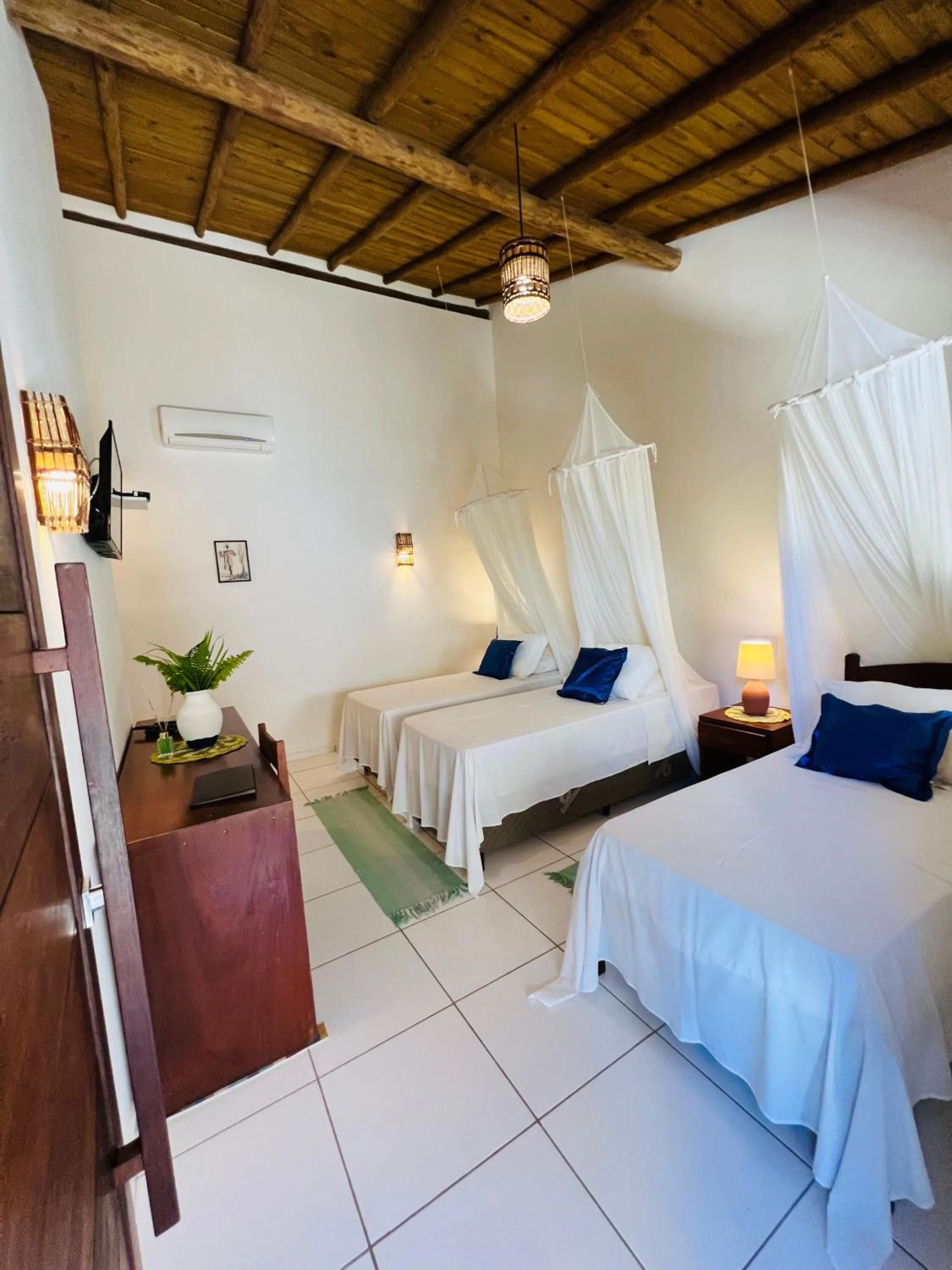 Triple Room - single occupancy in Pousada Pandoro