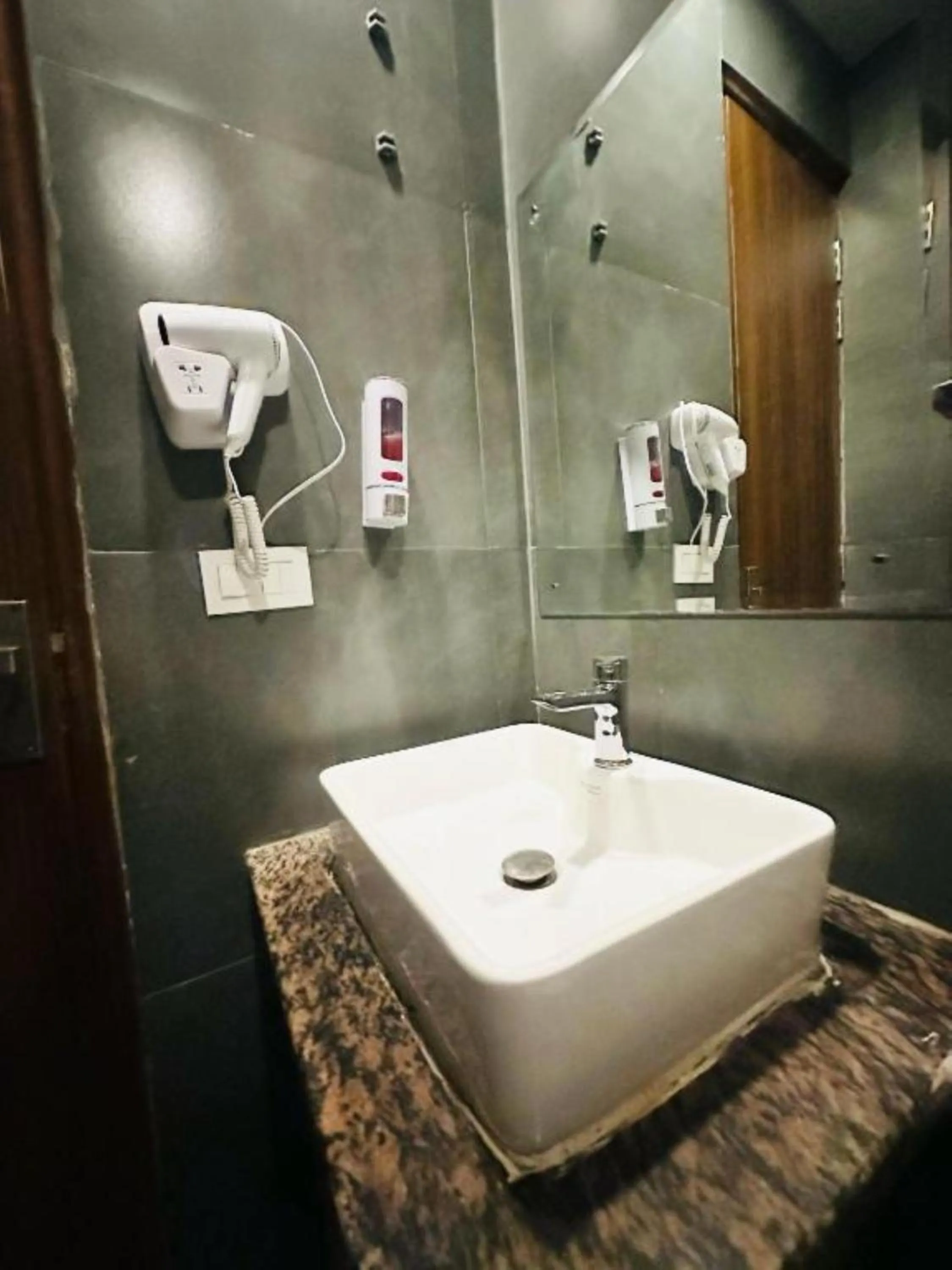 Shower in Hotel Precesion Palace Near Delhi Airport