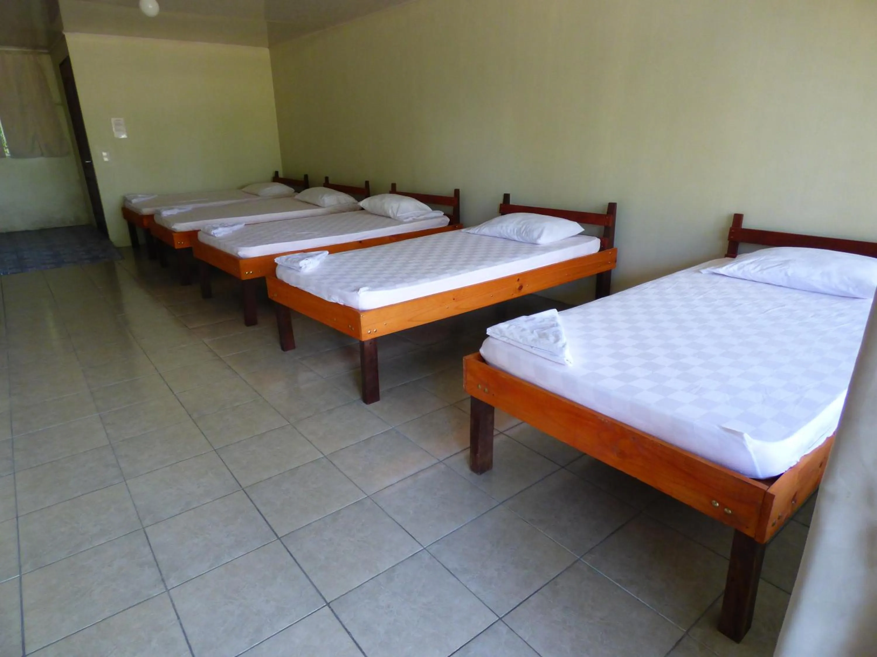 Photo of the whole room, Bed in Corcovado Beach Lodge