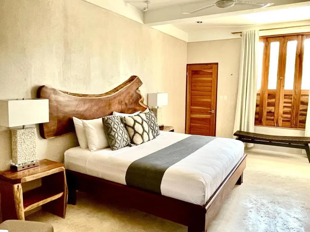Bed in Holbox Deluxe Apartments