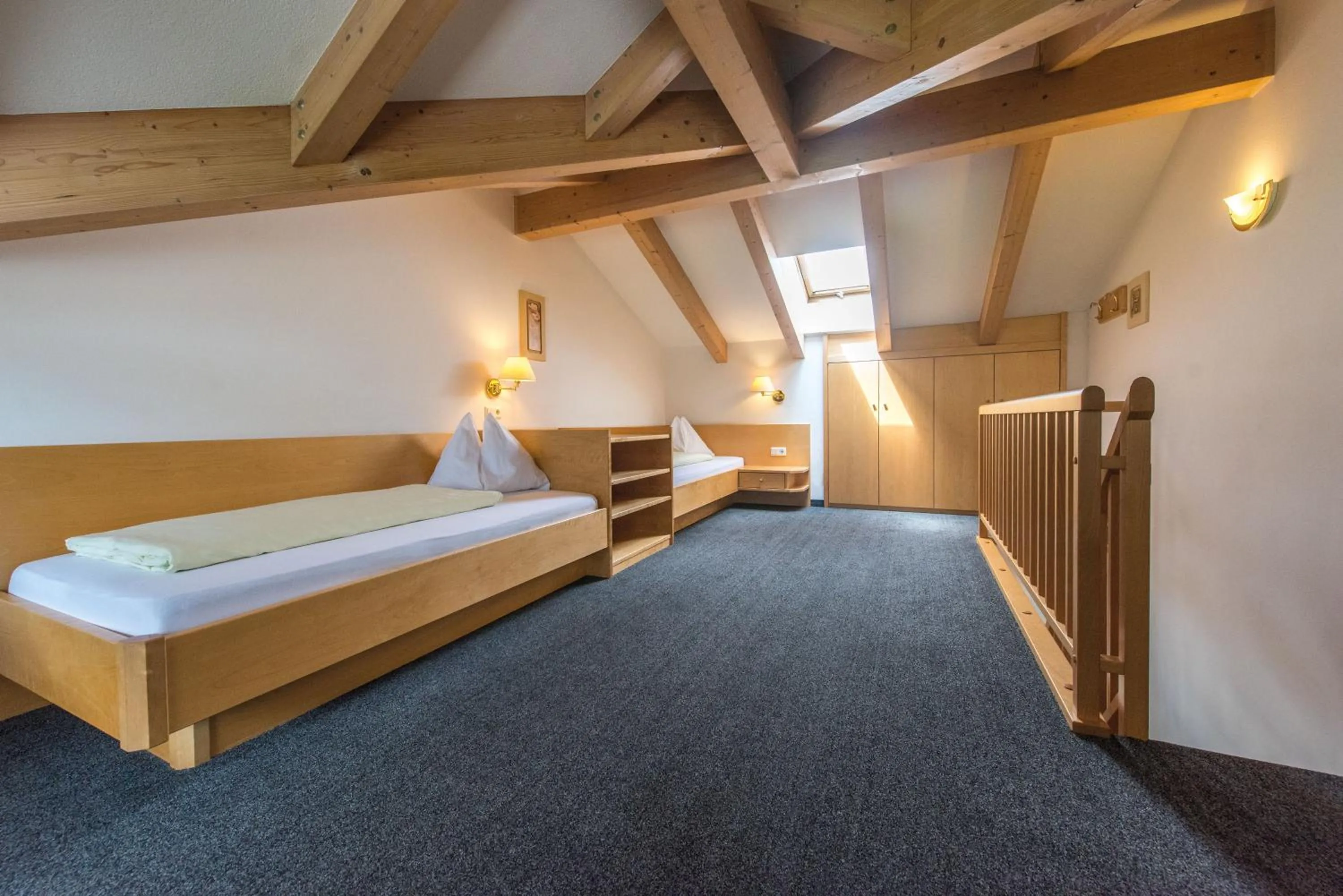 Bed in Hotel Fronza - your ski & mountain home
