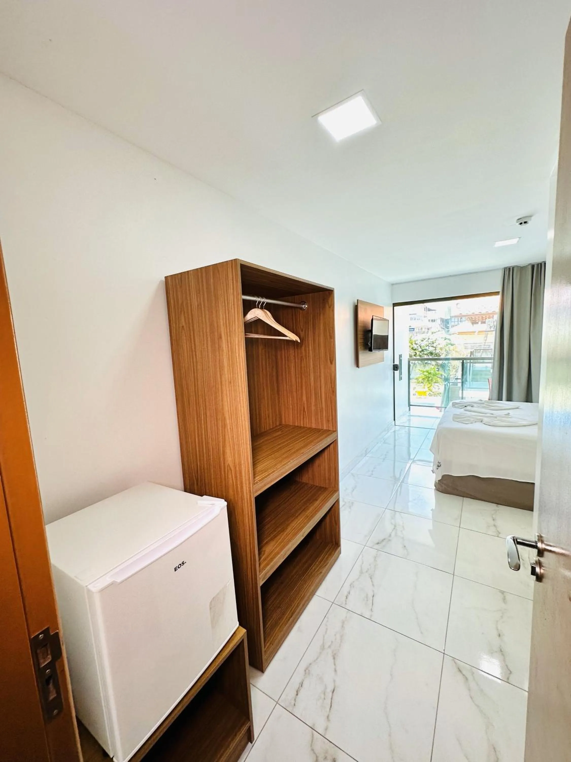 Bed in Pousada Sky Beach Flat