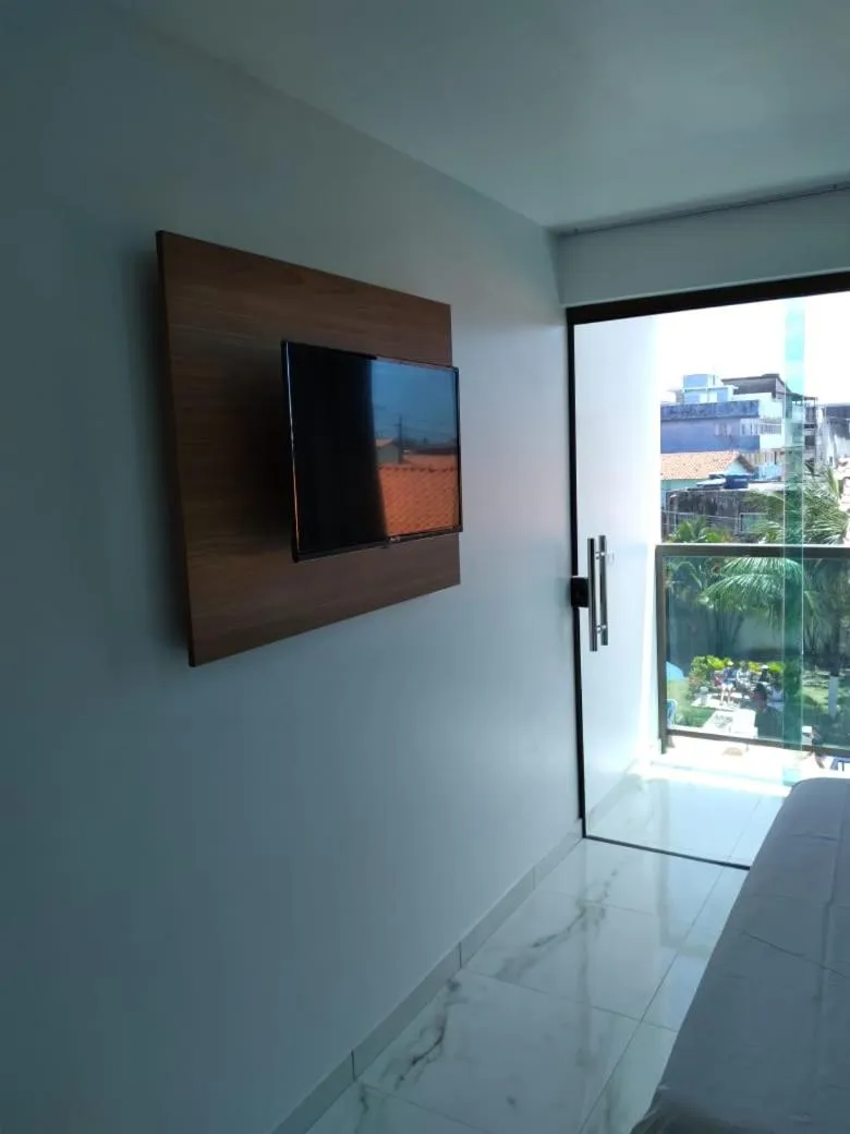 Bed in Pousada Sky Beach Flat