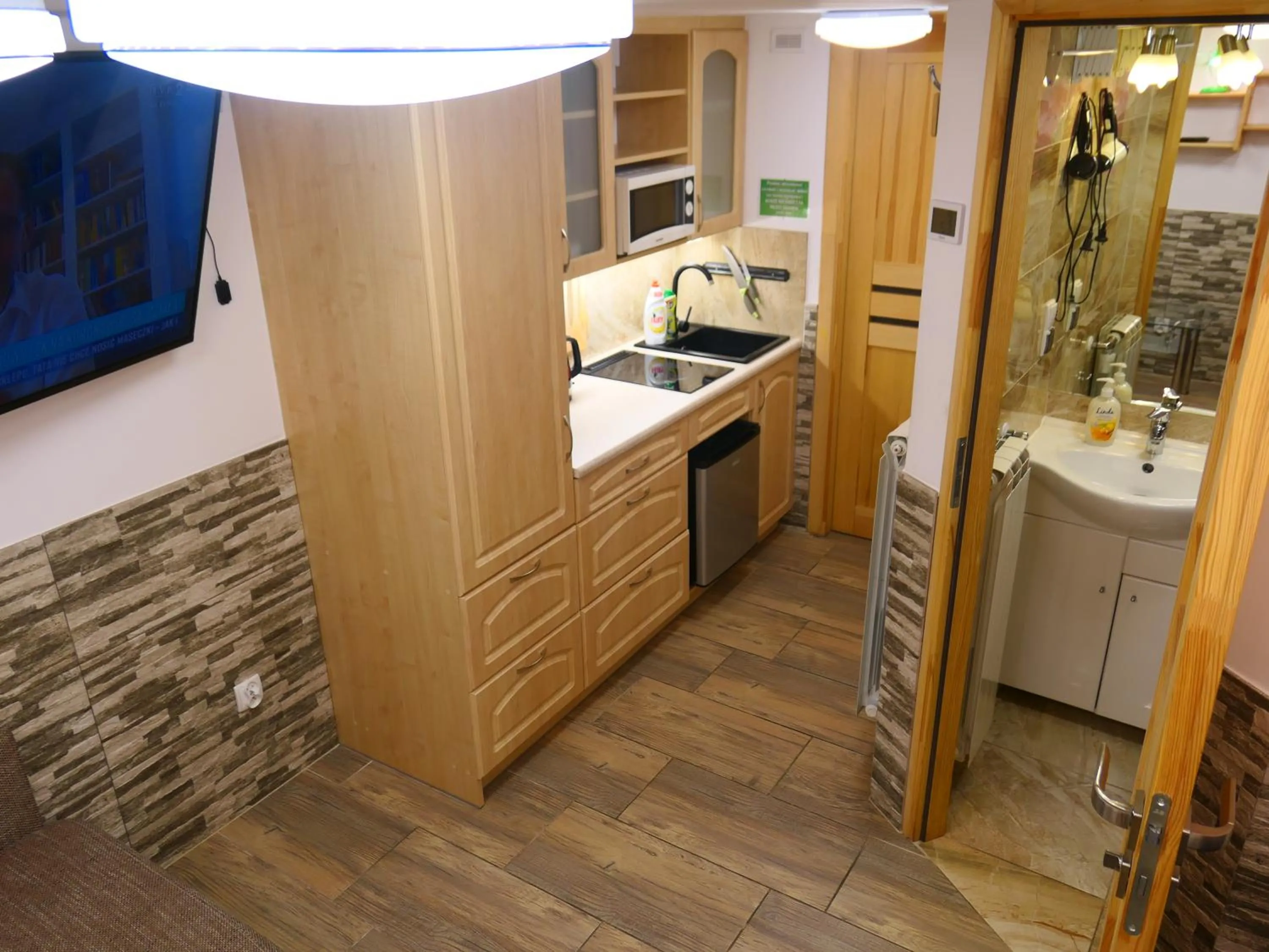 Kitchen or kitchenette in Apartamenty u Łukasza