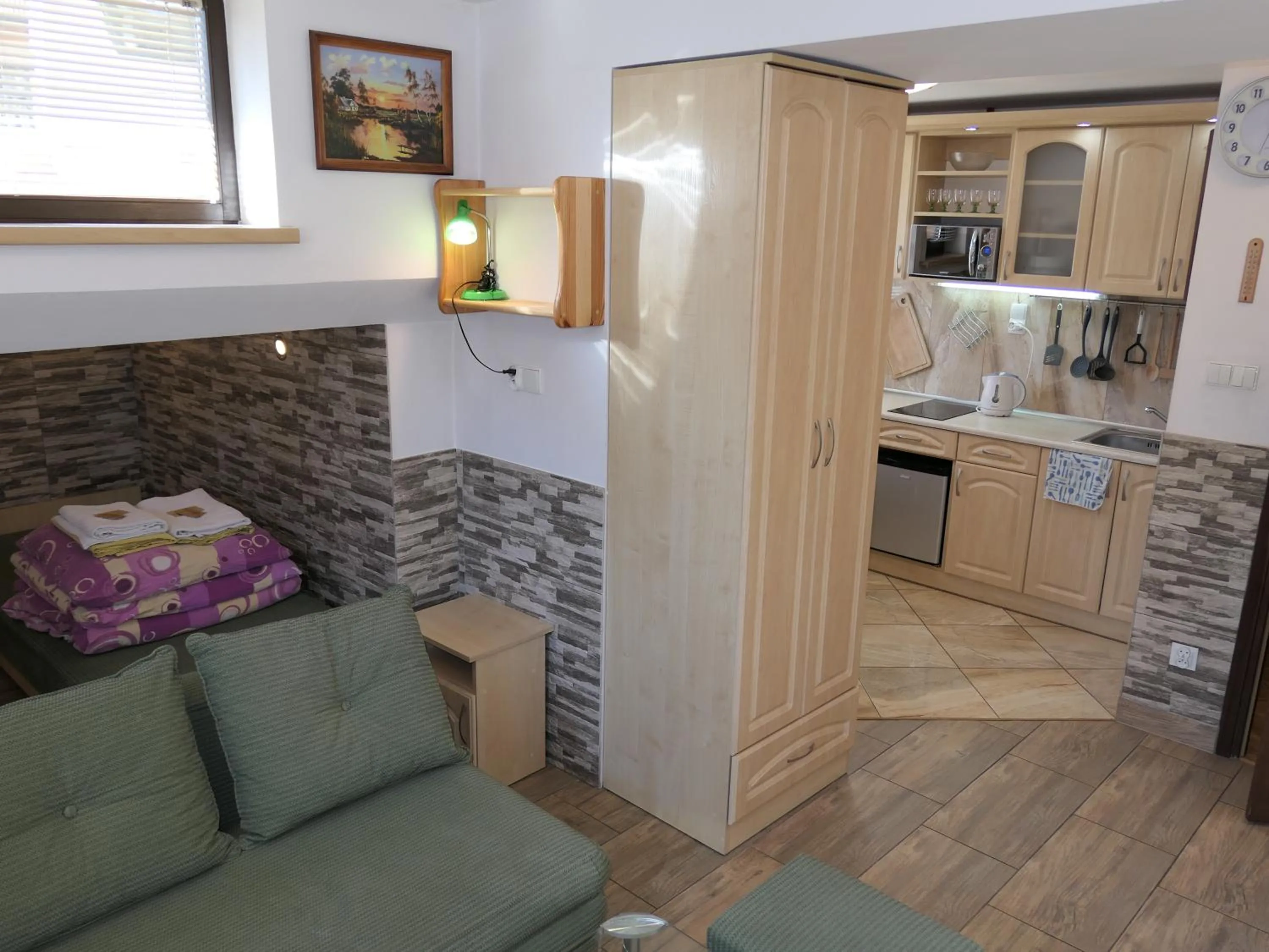 Kitchen or kitchenette in Apartamenty u Łukasza