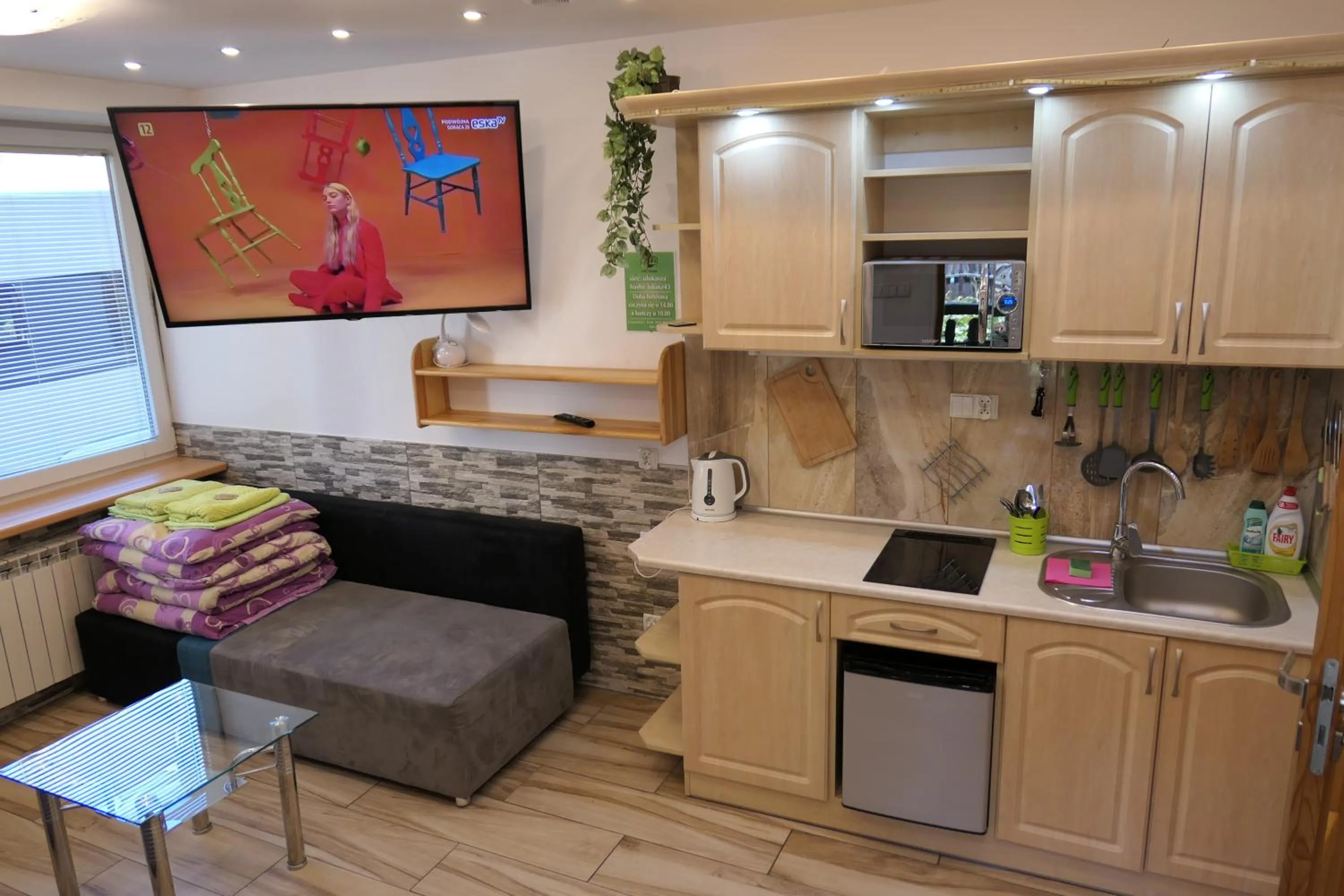 Kitchen or kitchenette in Apartamenty u Łukasza