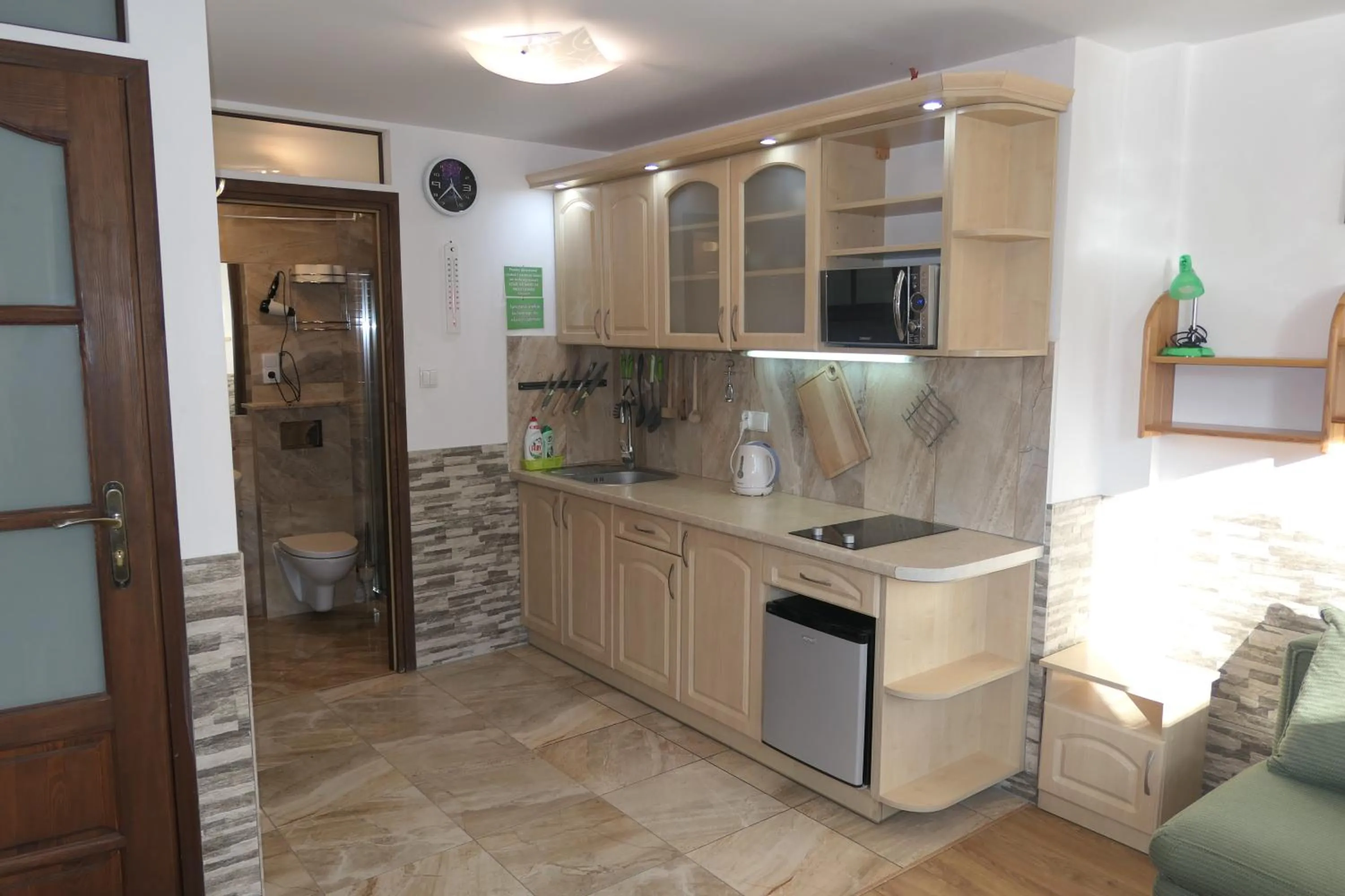 Kitchen or kitchenette in Apartamenty u Łukasza