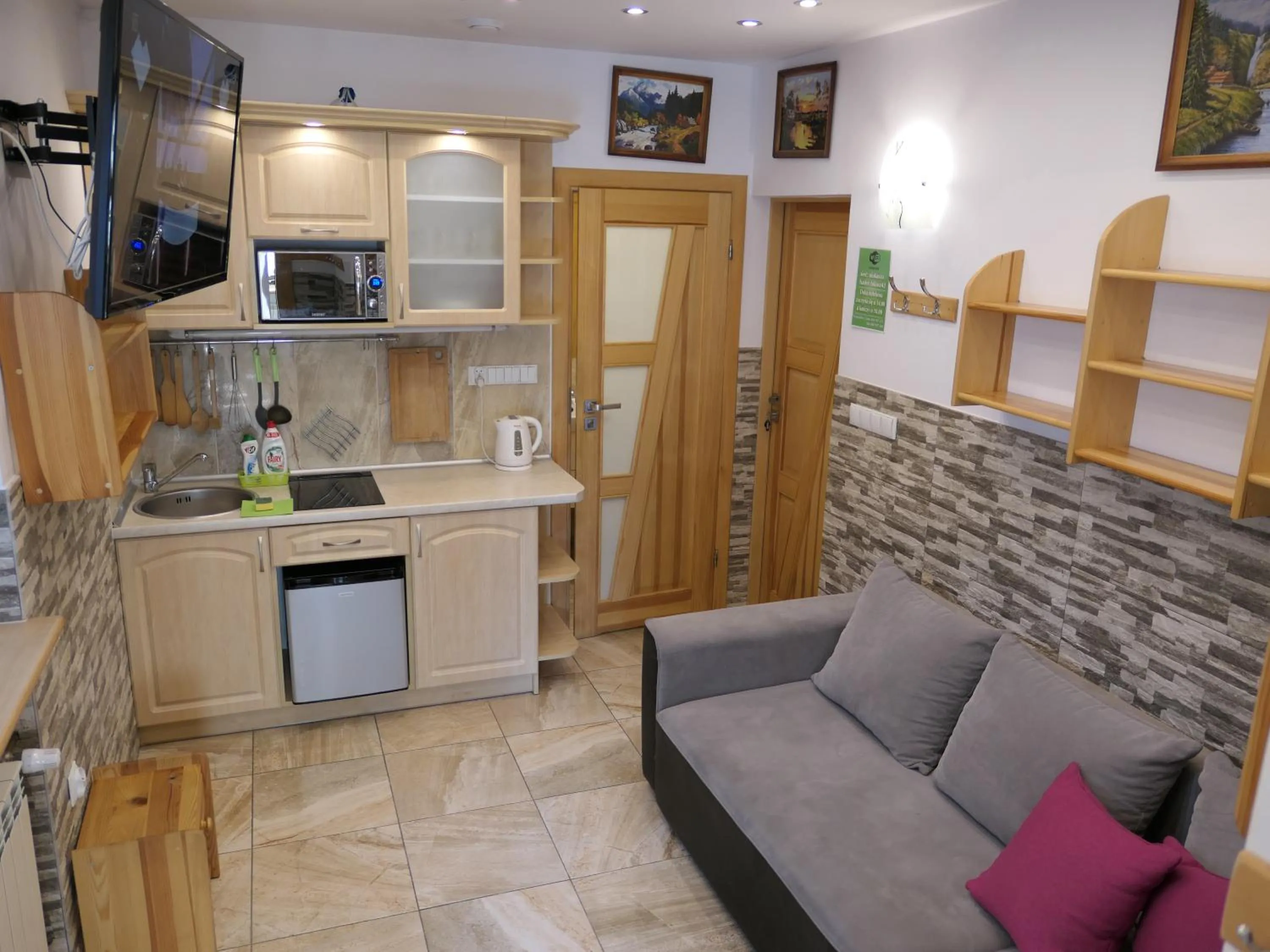 Kitchen or kitchenette in Apartamenty u Łukasza