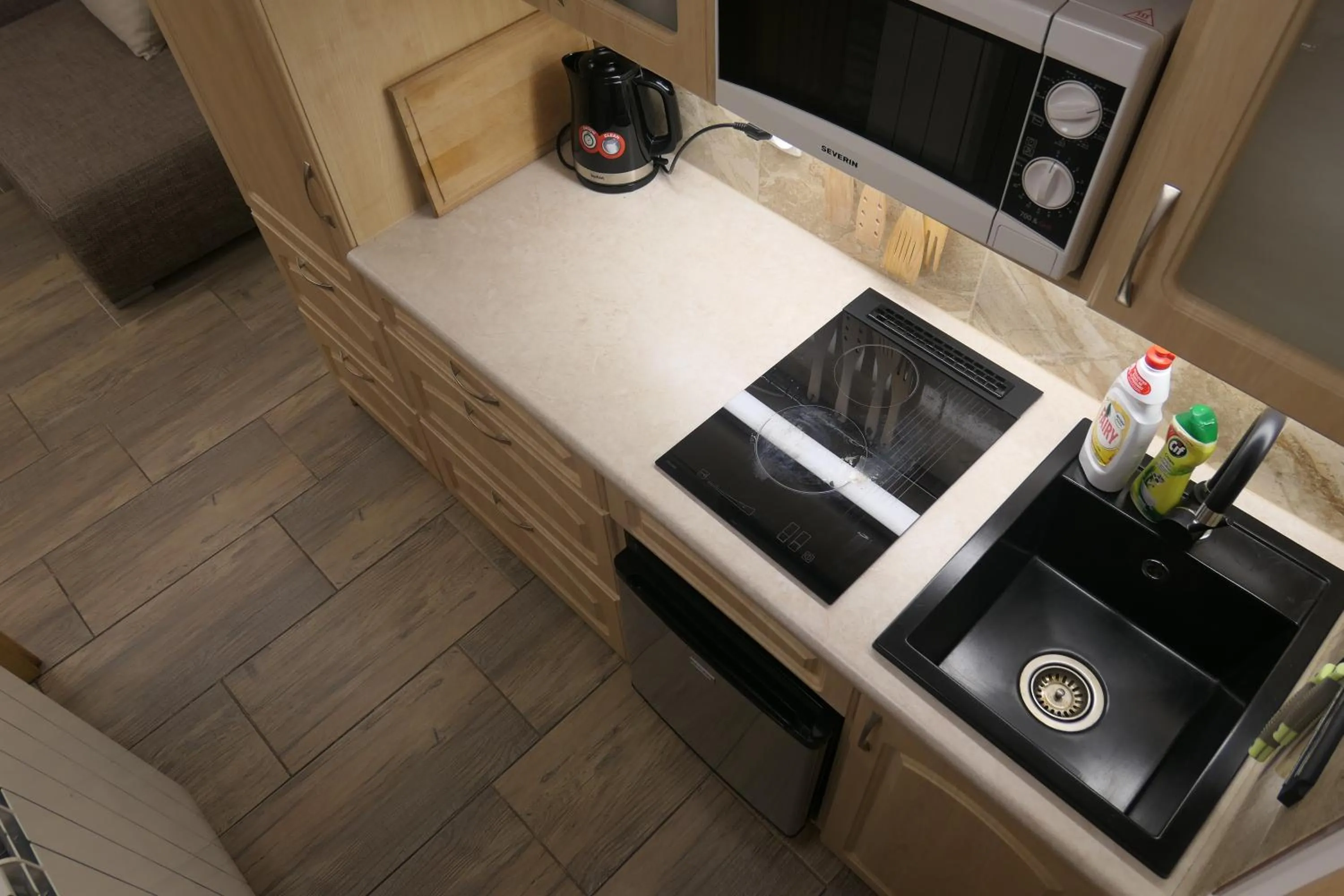 Kitchen or kitchenette in Apartamenty u Łukasza