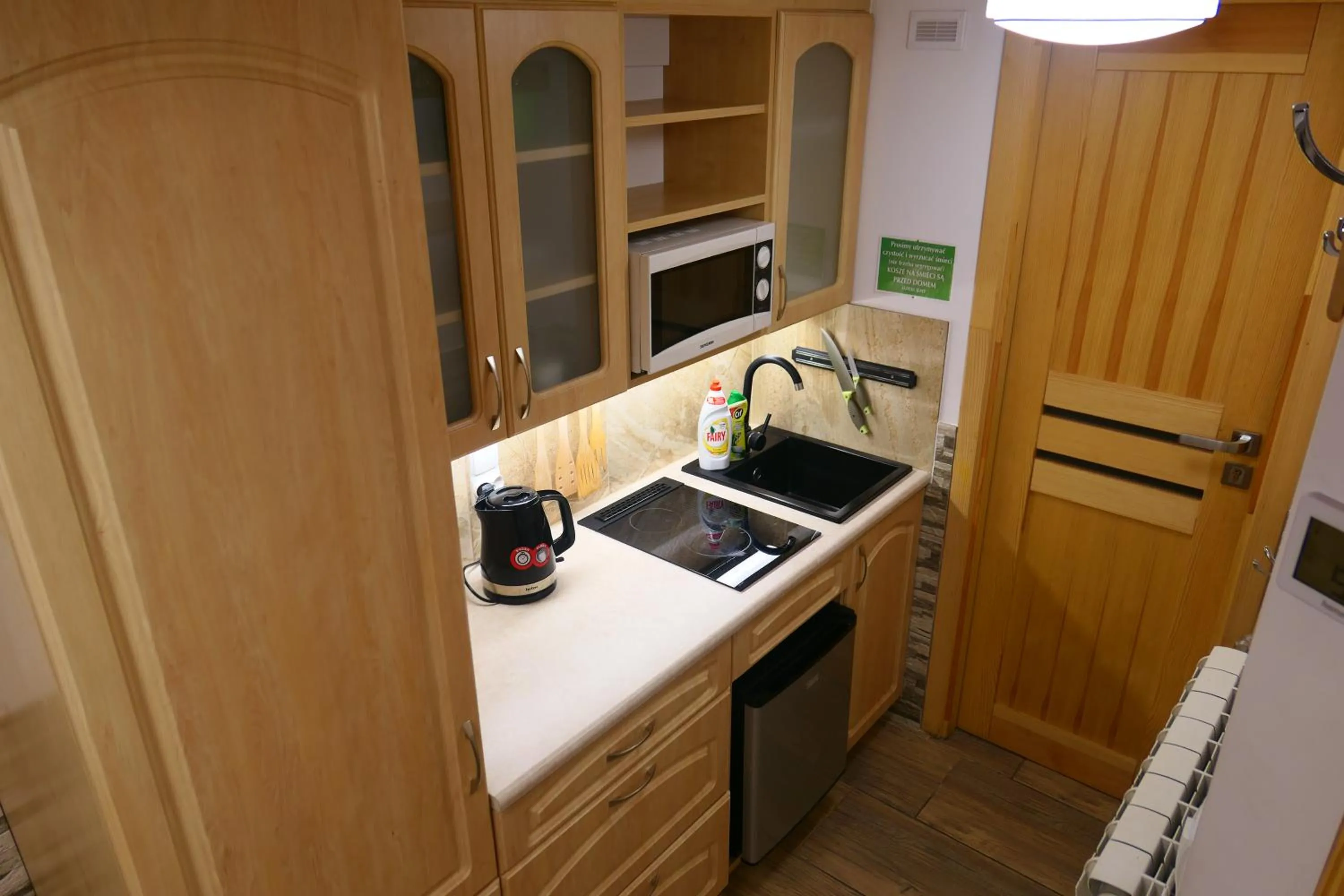 Kitchen or kitchenette in Apartamenty u Łukasza