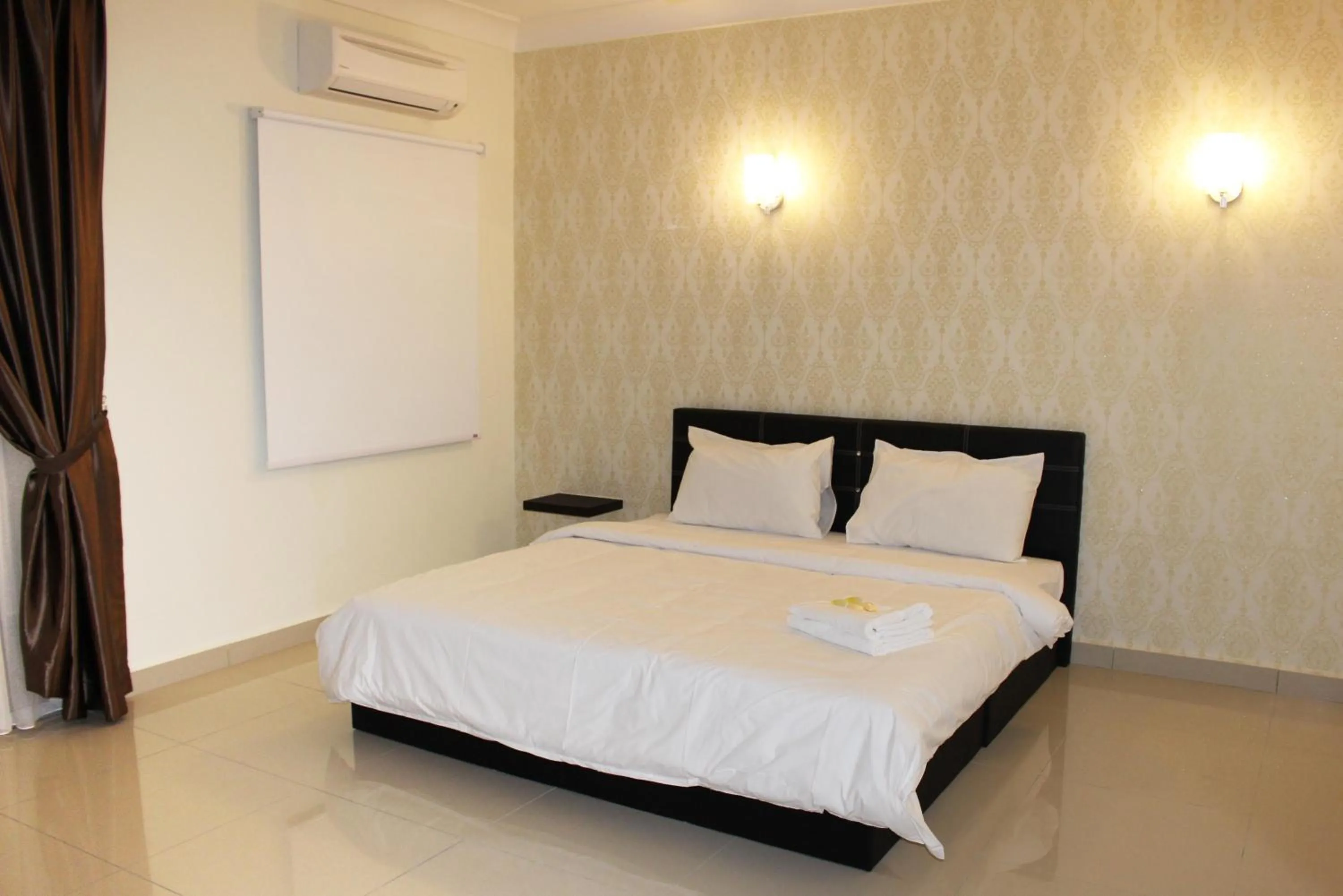 Photo of the whole room, Bed in Tiara Desaru Seaview Residence