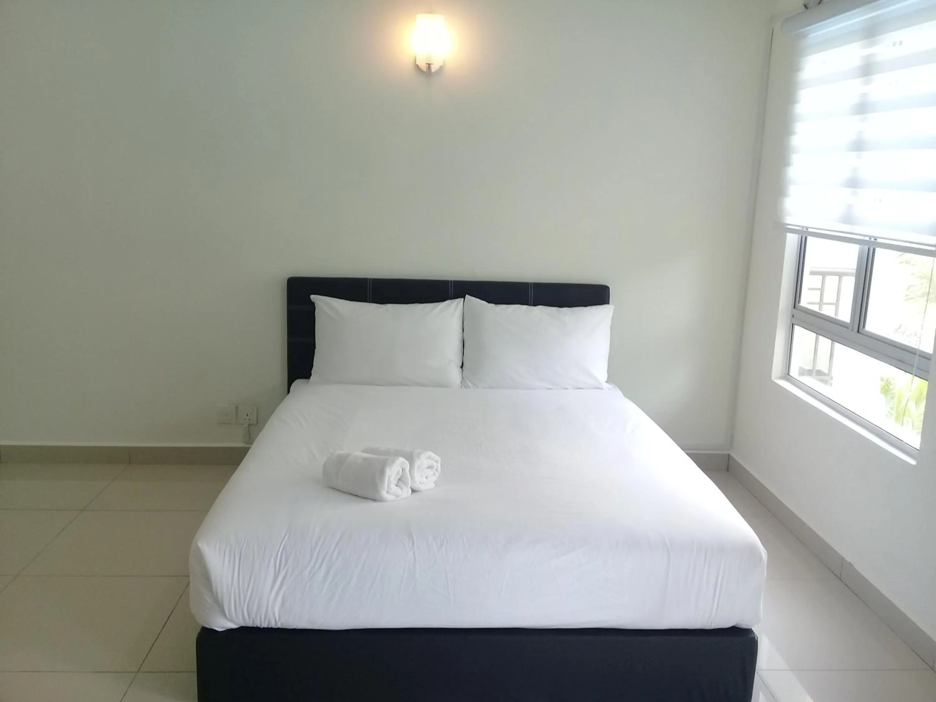 Bed in Tiara Desaru Seaview Residence