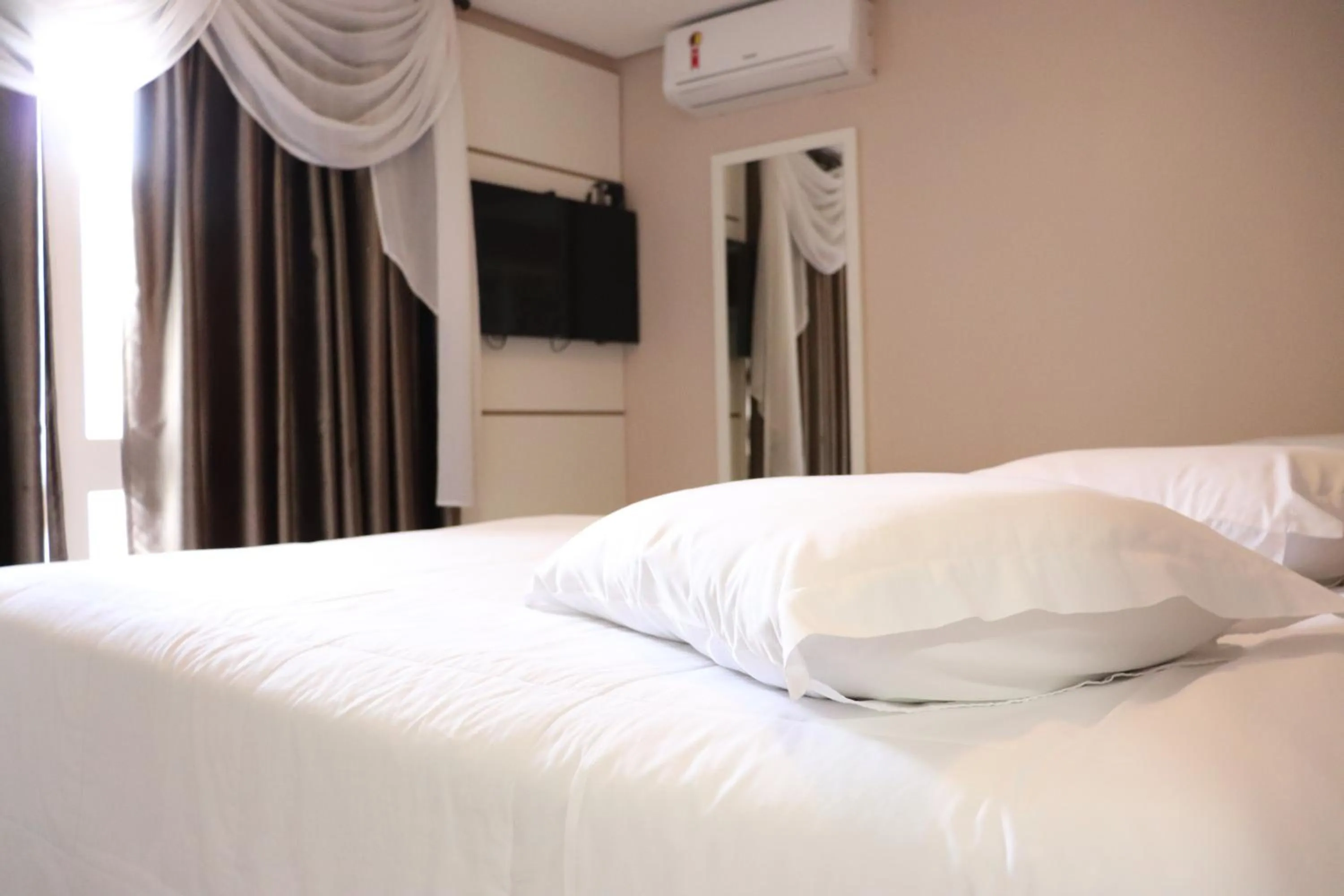 Bed in Pousada Vovô Nino