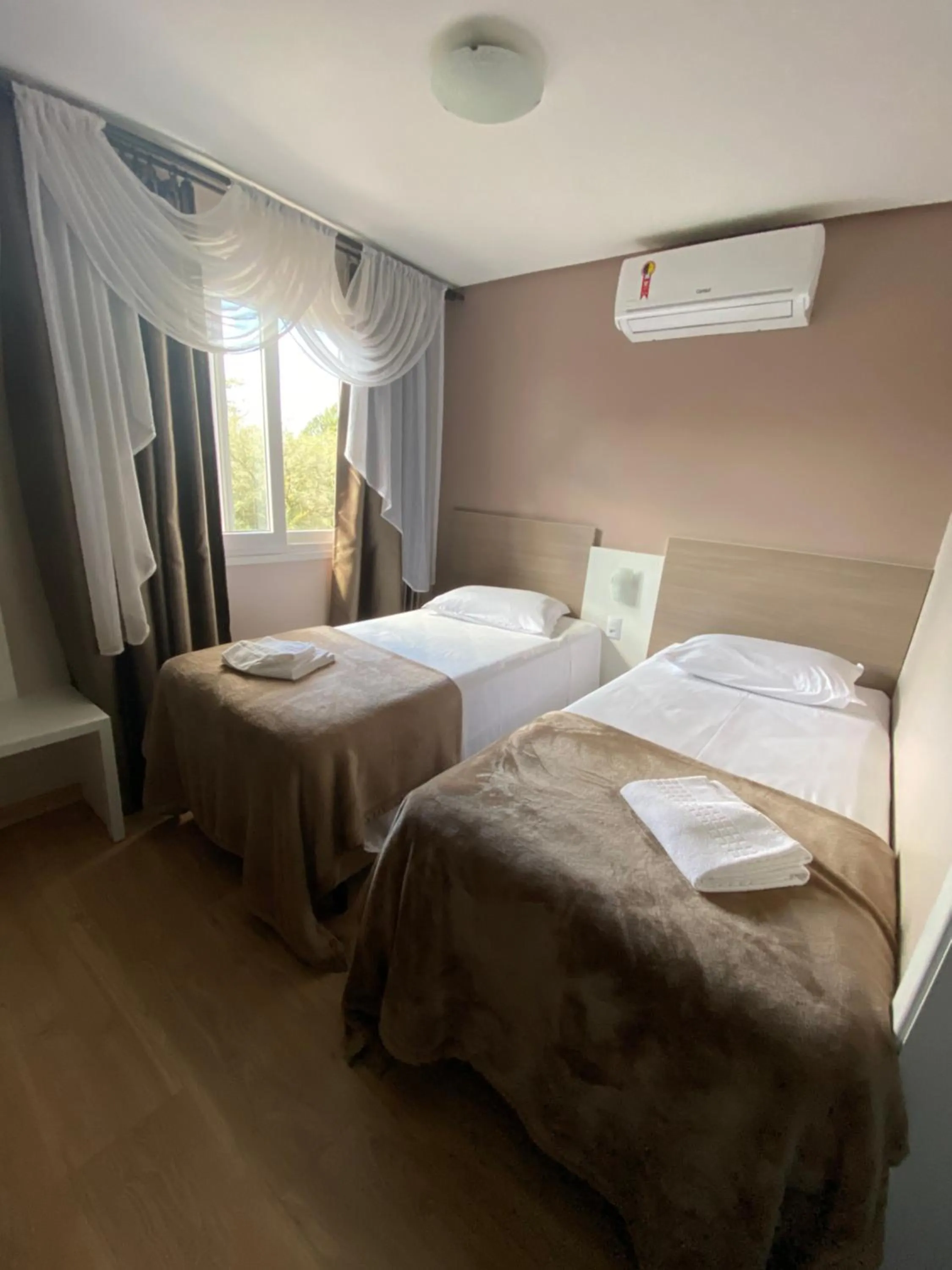 Bed in Pousada Vovô Nino