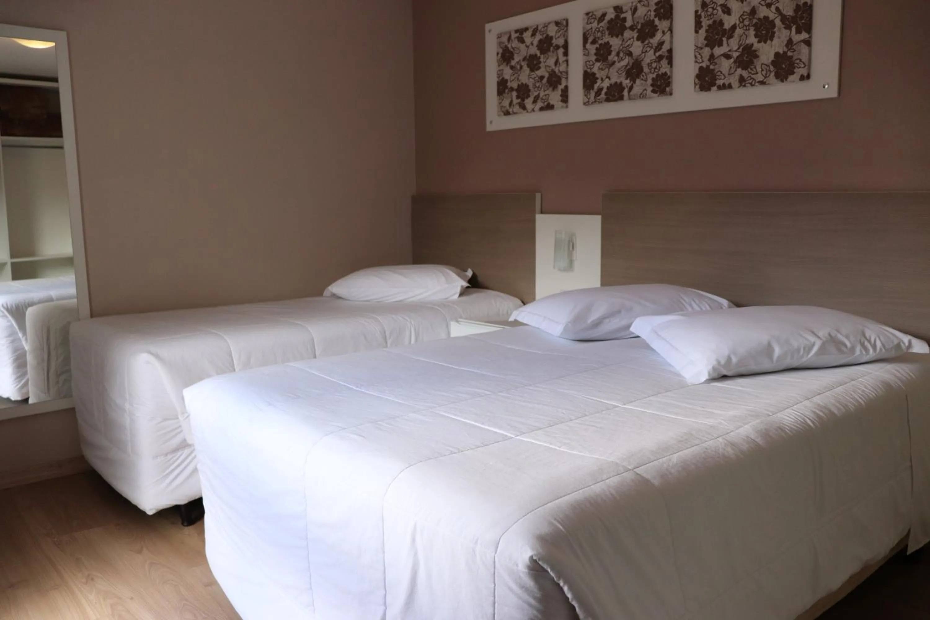 Bed in Pousada Vovô Nino