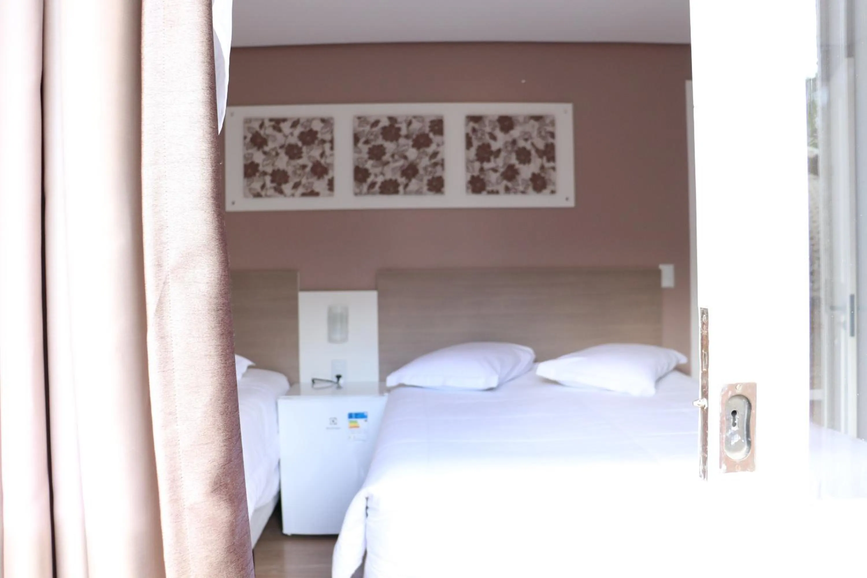 Bed in Pousada Vovô Nino