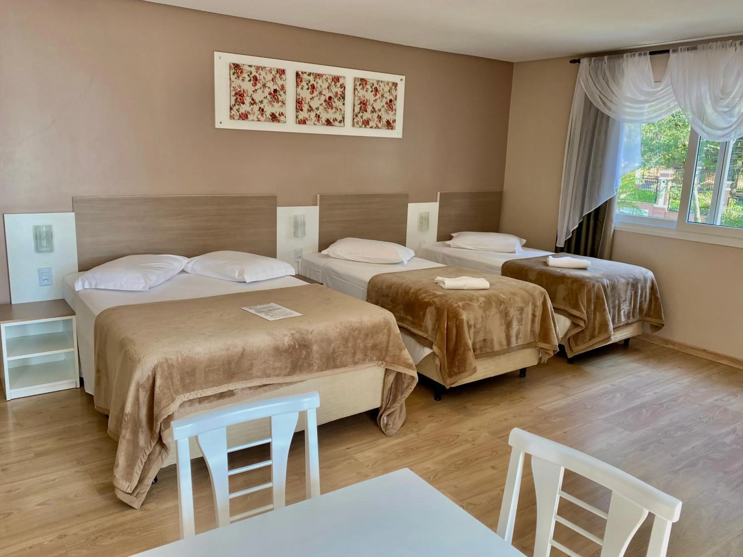 Bed in Pousada Vovô Nino