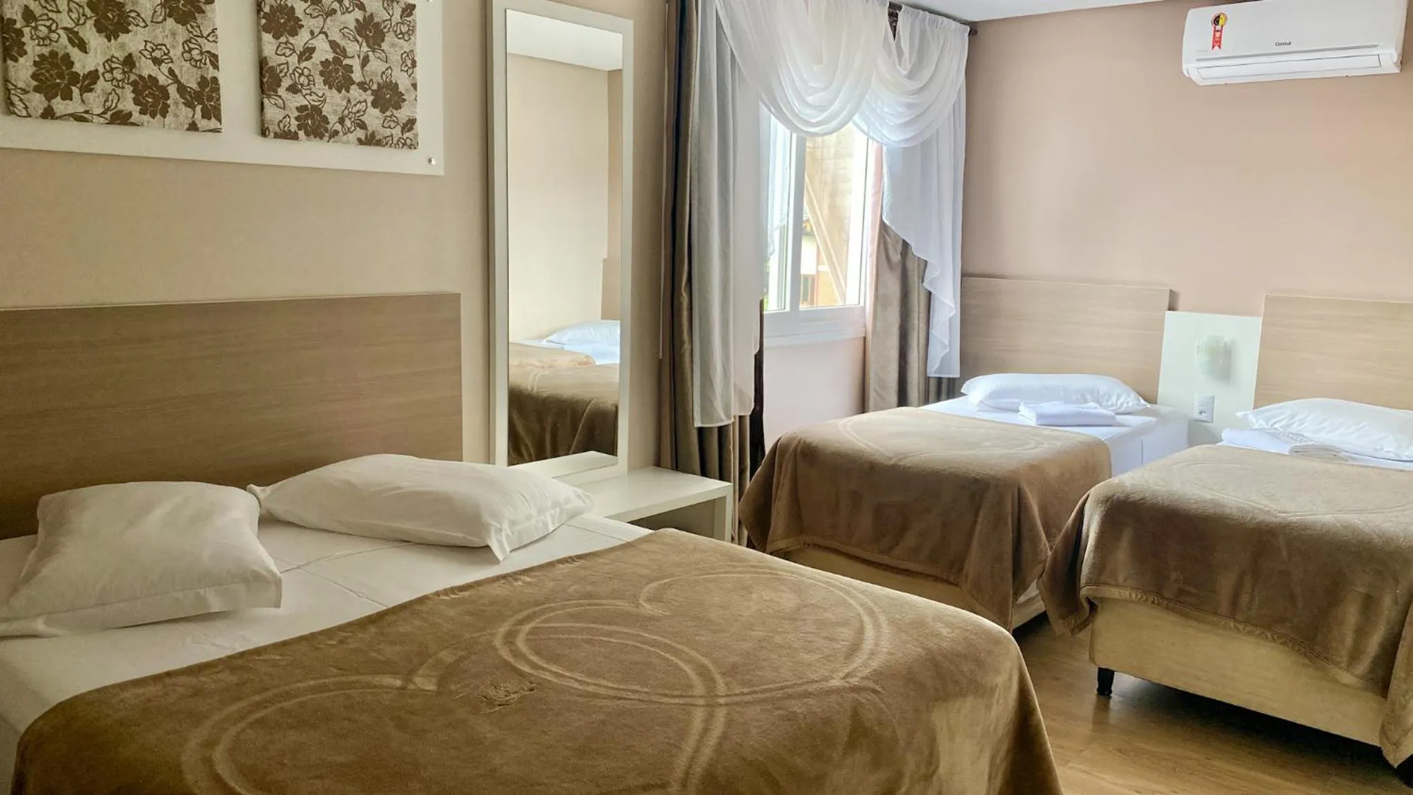 Bed in Pousada Vovô Nino