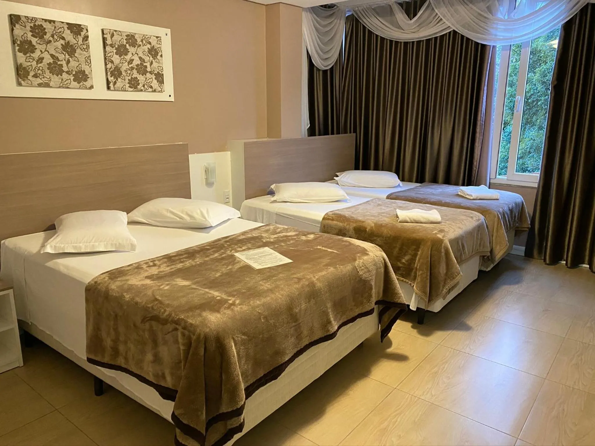 Bed in Pousada Vovô Nino