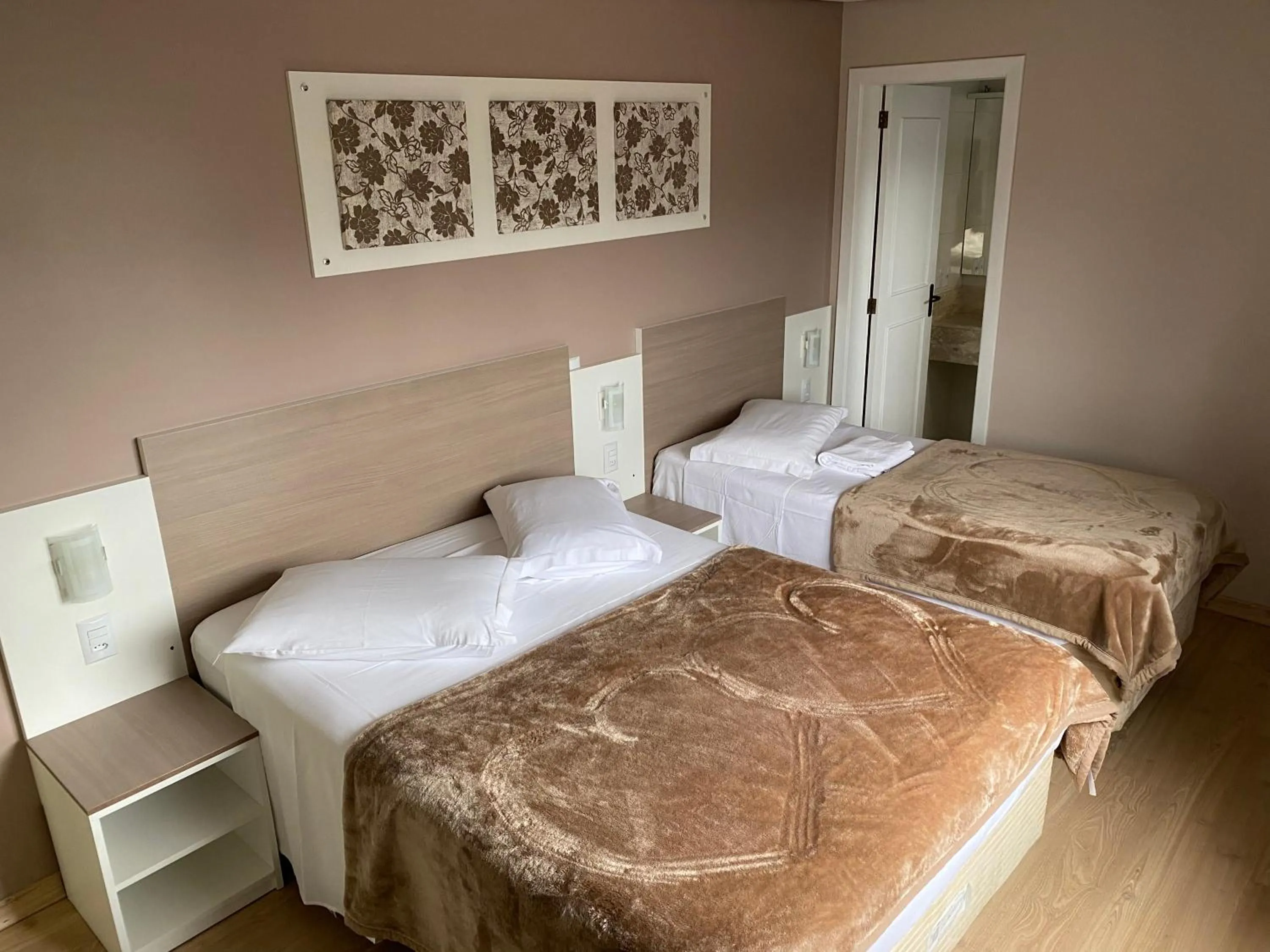 Bed in Pousada Vovô Nino