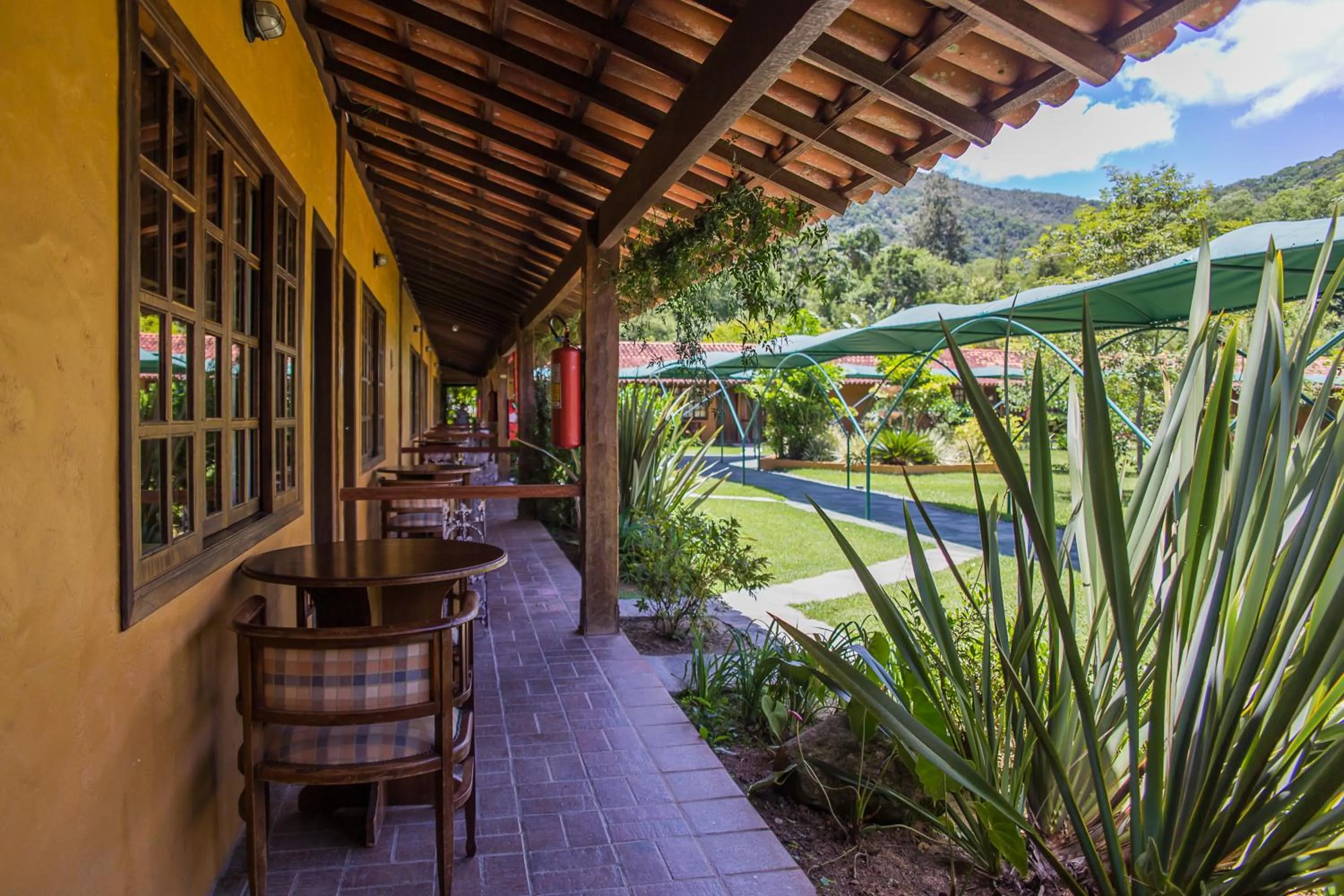 Patio in Bomtempo Itaipava by Castelo Itaipava