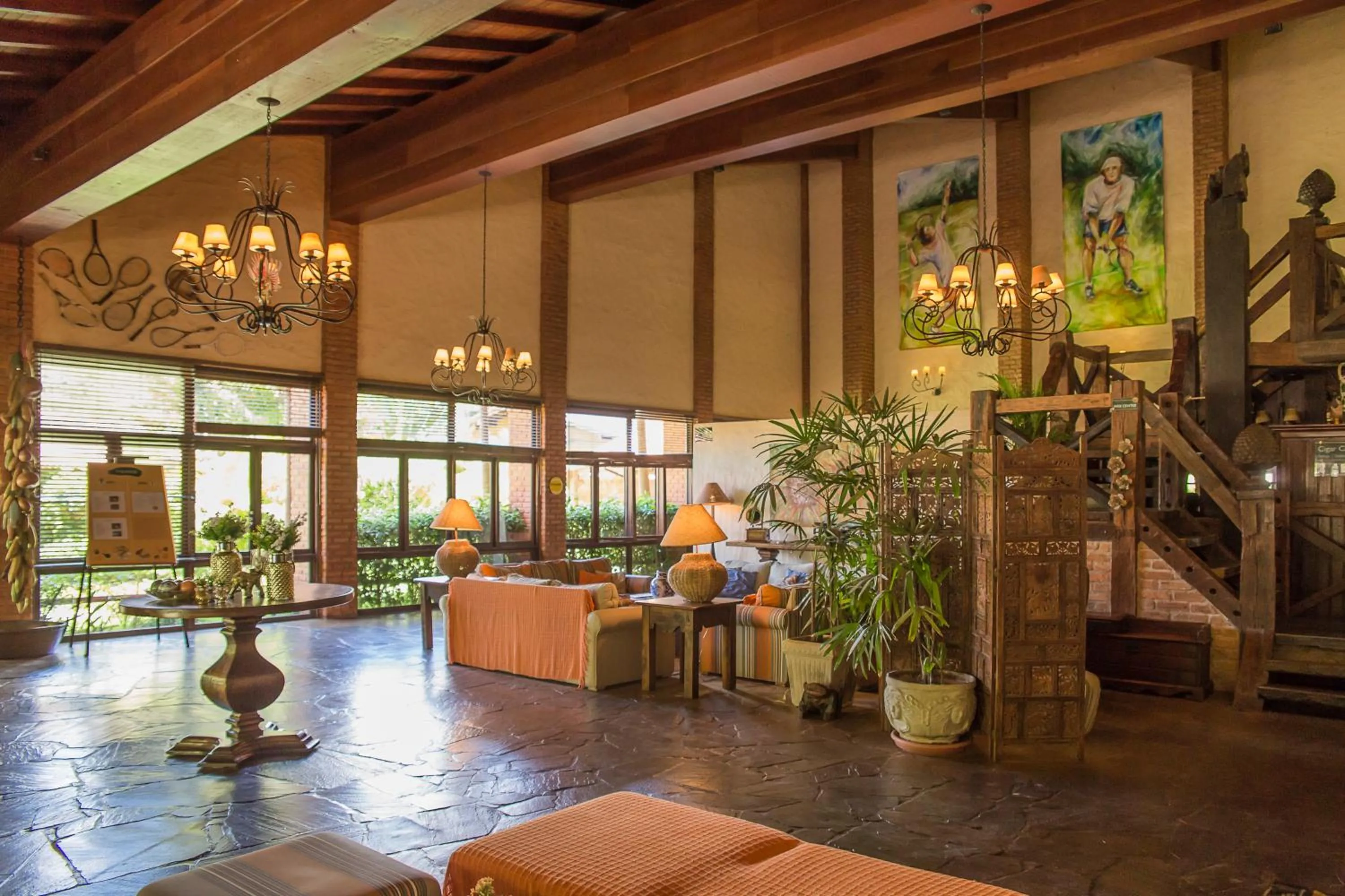 Living room in Bomtempo Itaipava by Castelo Itaipava