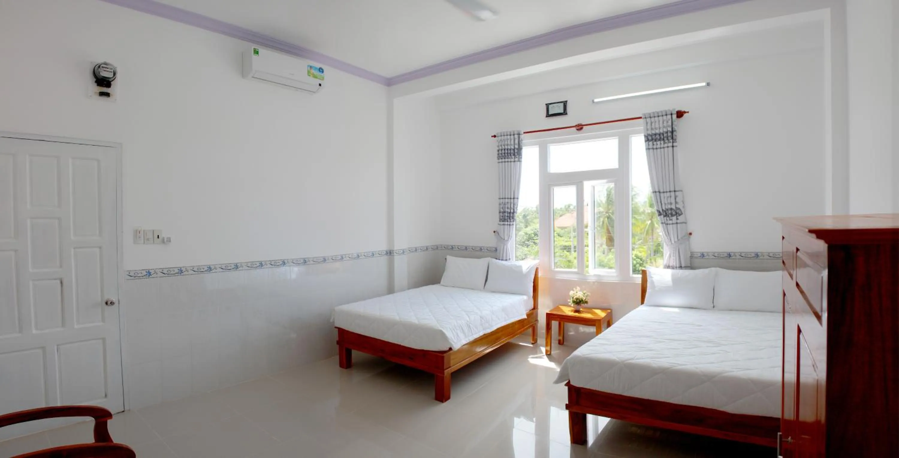 Bed in Hung Phuc Mui Ne Hotel