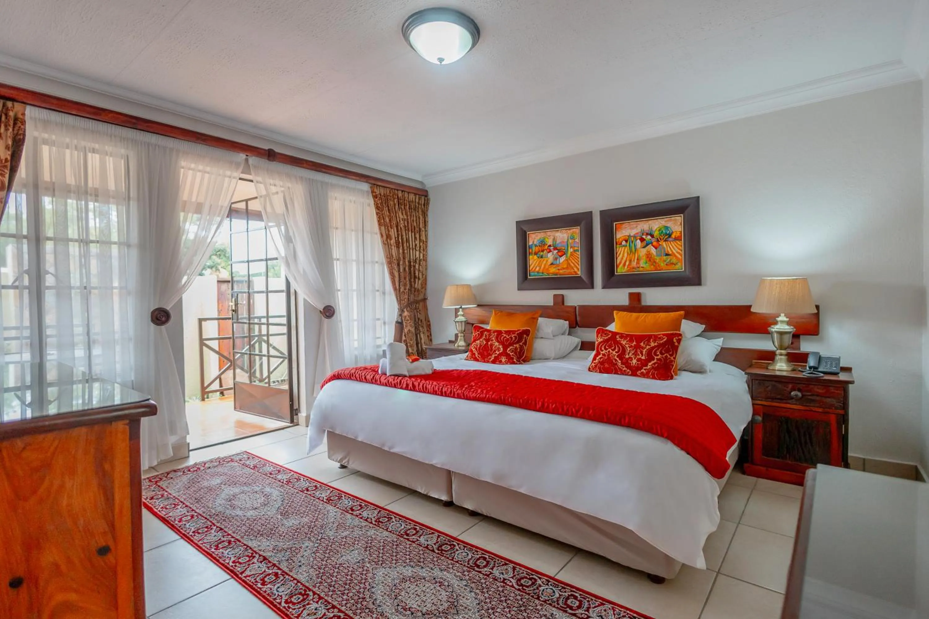 Bedroom, Bed in Afrique Boutique Hotel O.R. Tambo