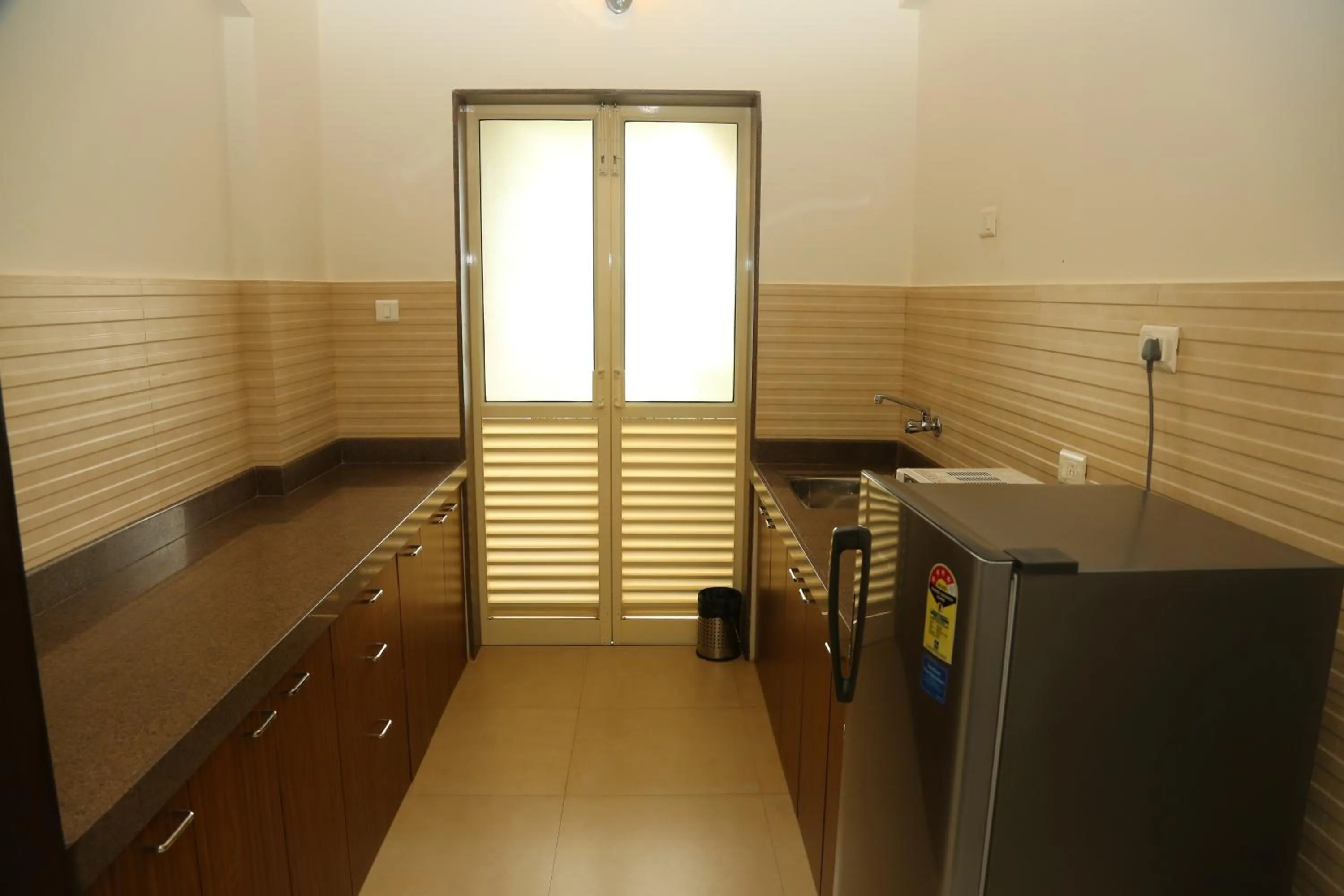 Kitchen or kitchenette in La Vida Studio Inn Baga- Goa- By Lords Hotels and Resorts