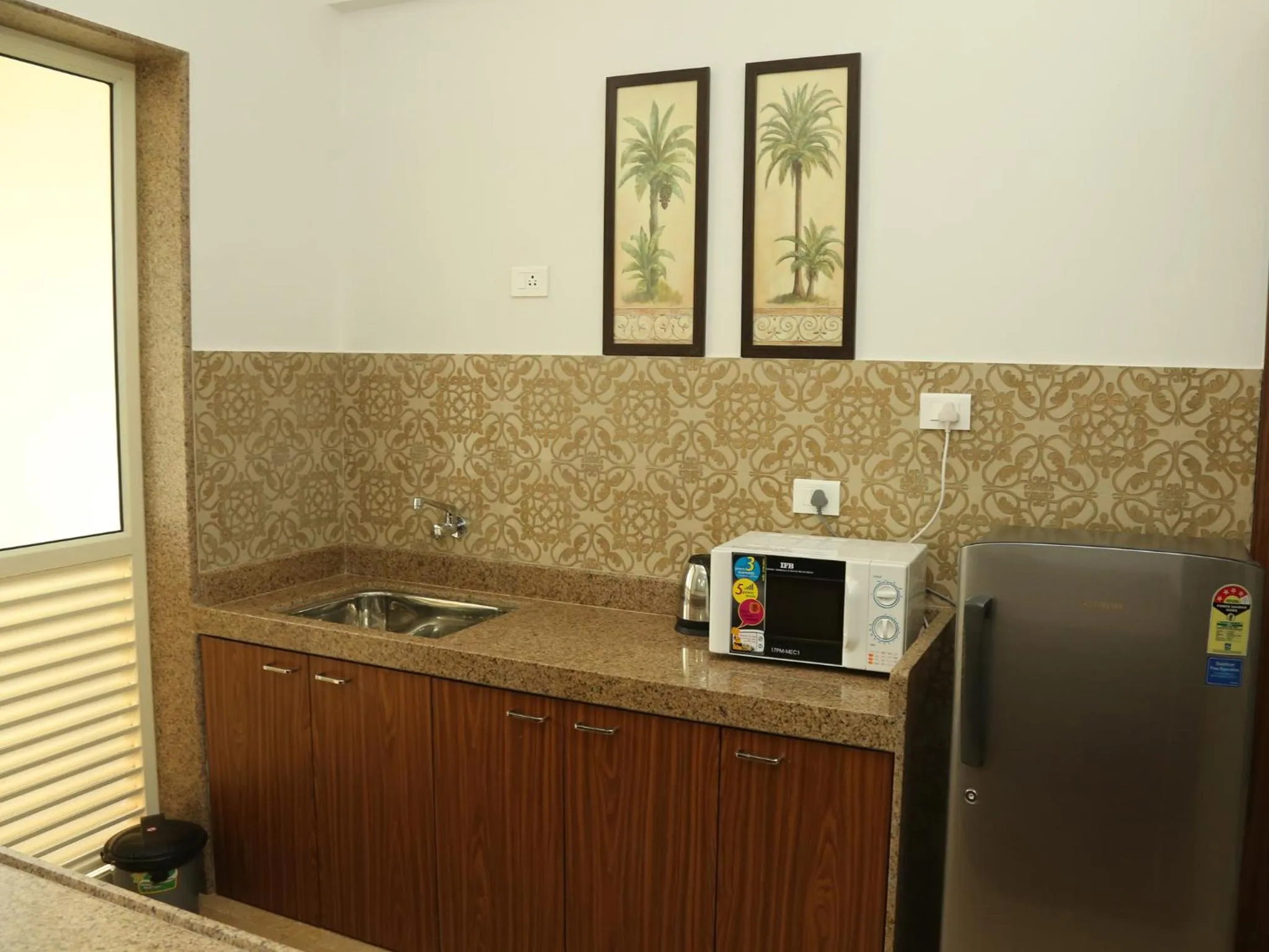 Kitchen or kitchenette in La Vida Studio Inn Baga- Goa- By Lords Hotels and Resorts