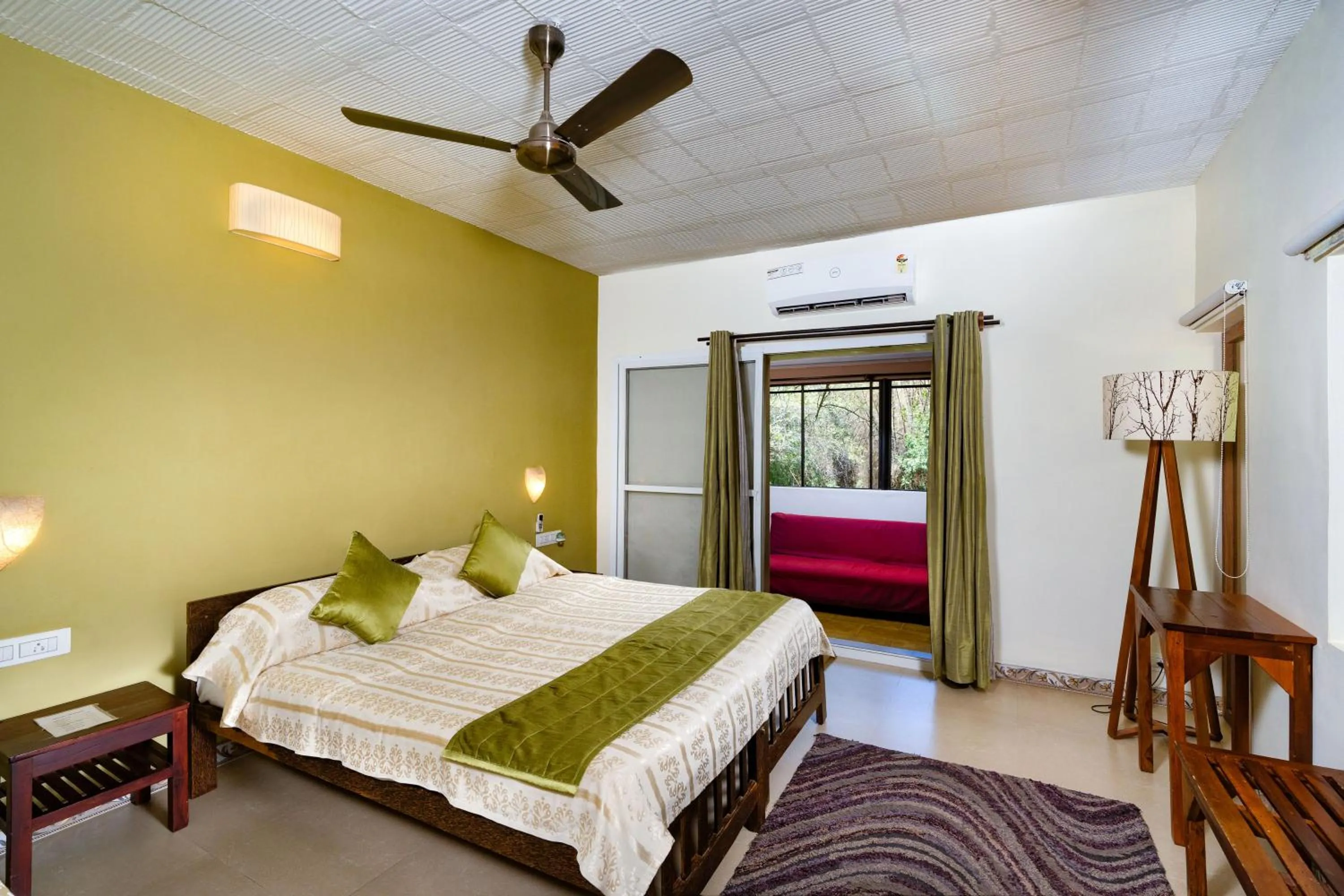 Bed in Jungle Hut Resort