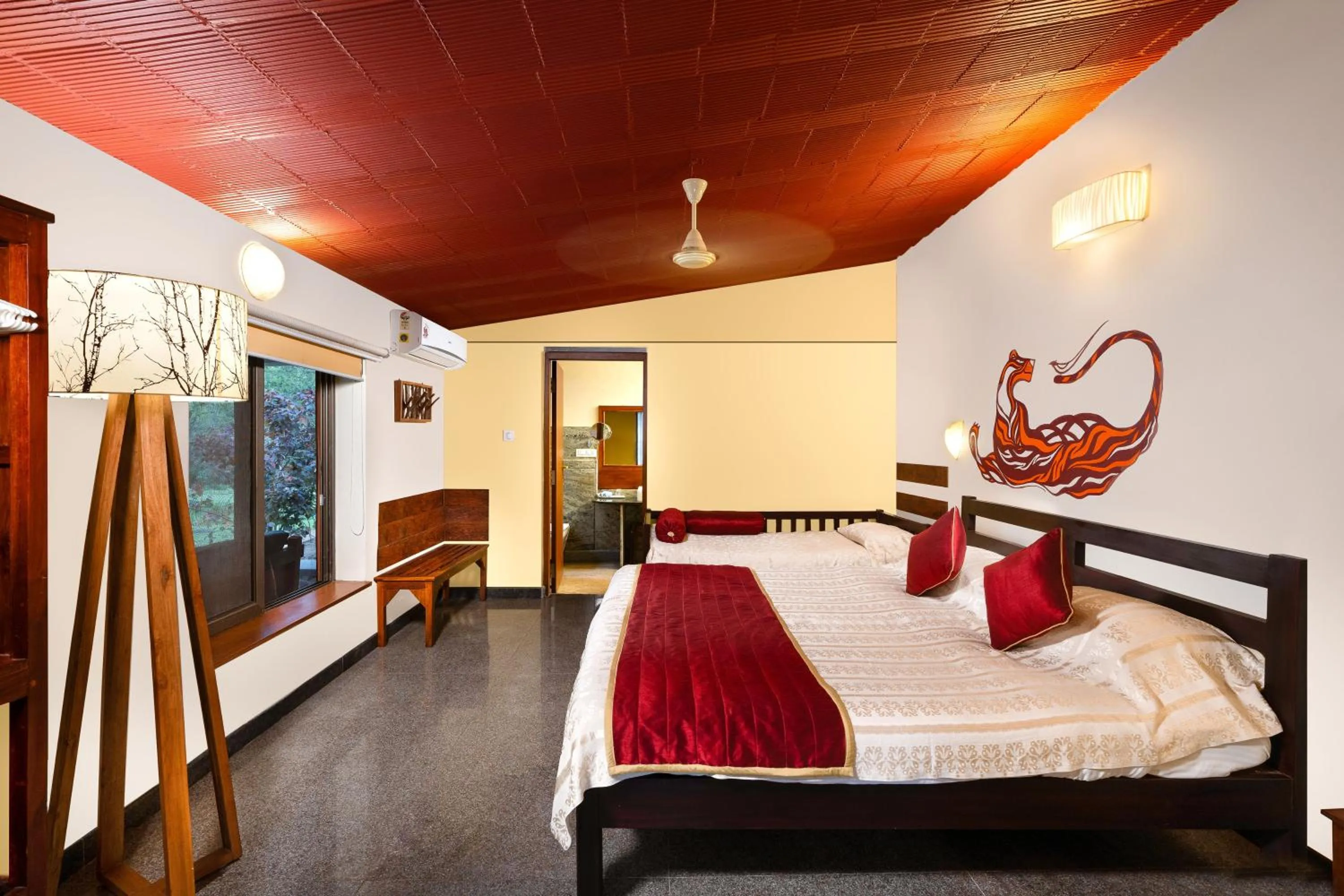 Bed in Jungle Hut Resort