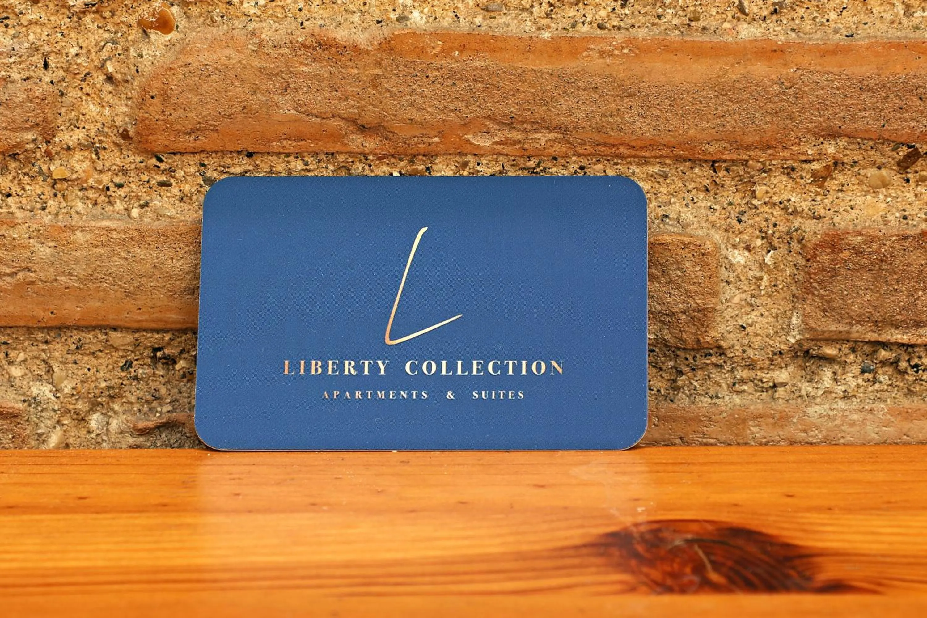 Property logo or sign in Grand Tour Rome Suites - Liberty Collection