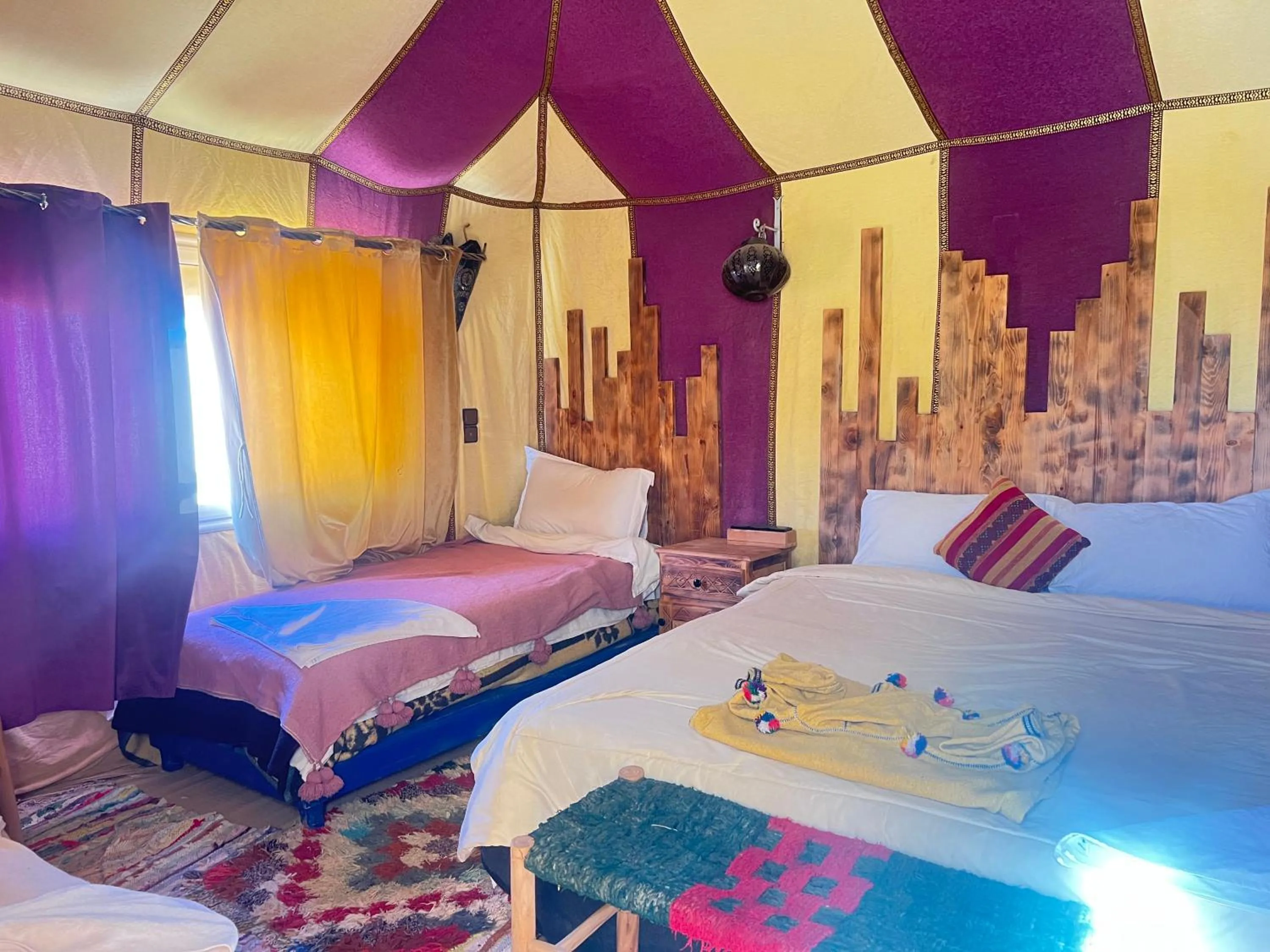 Bed in Merzouga Luxury Camp