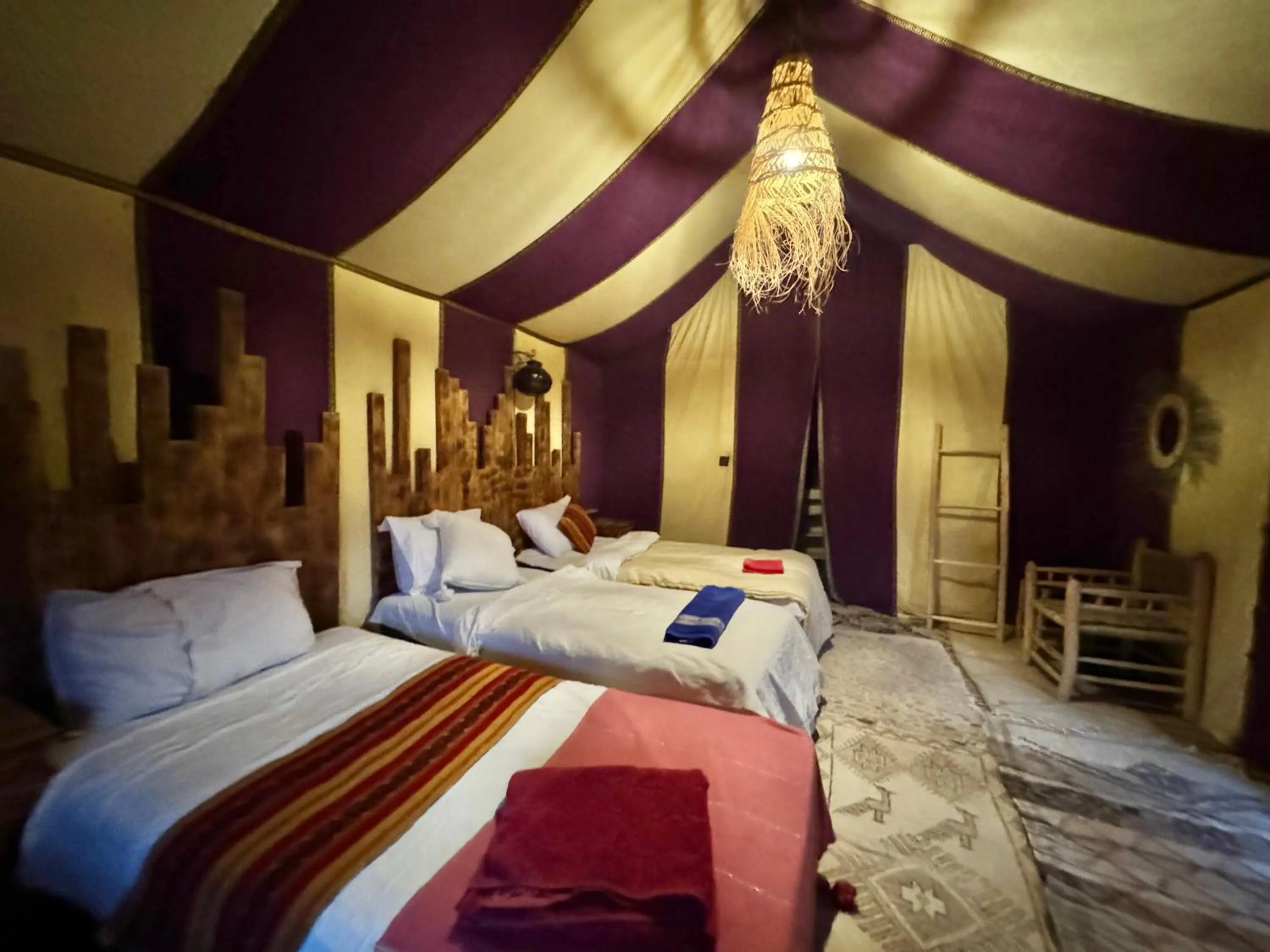 Bed in Merzouga Luxury Camp