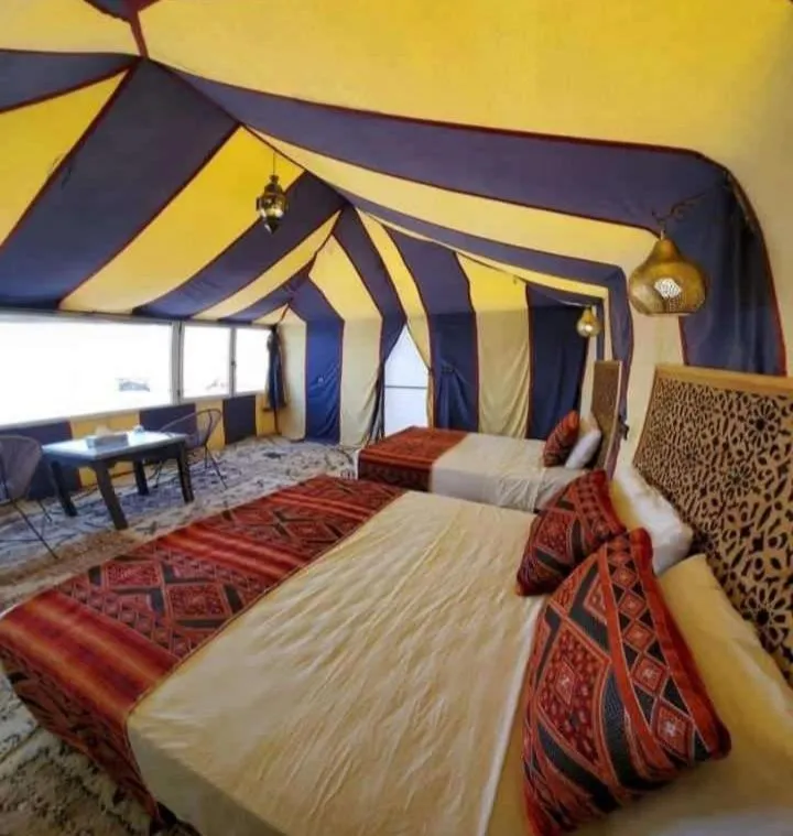 Bed in Merzouga Luxury Camp