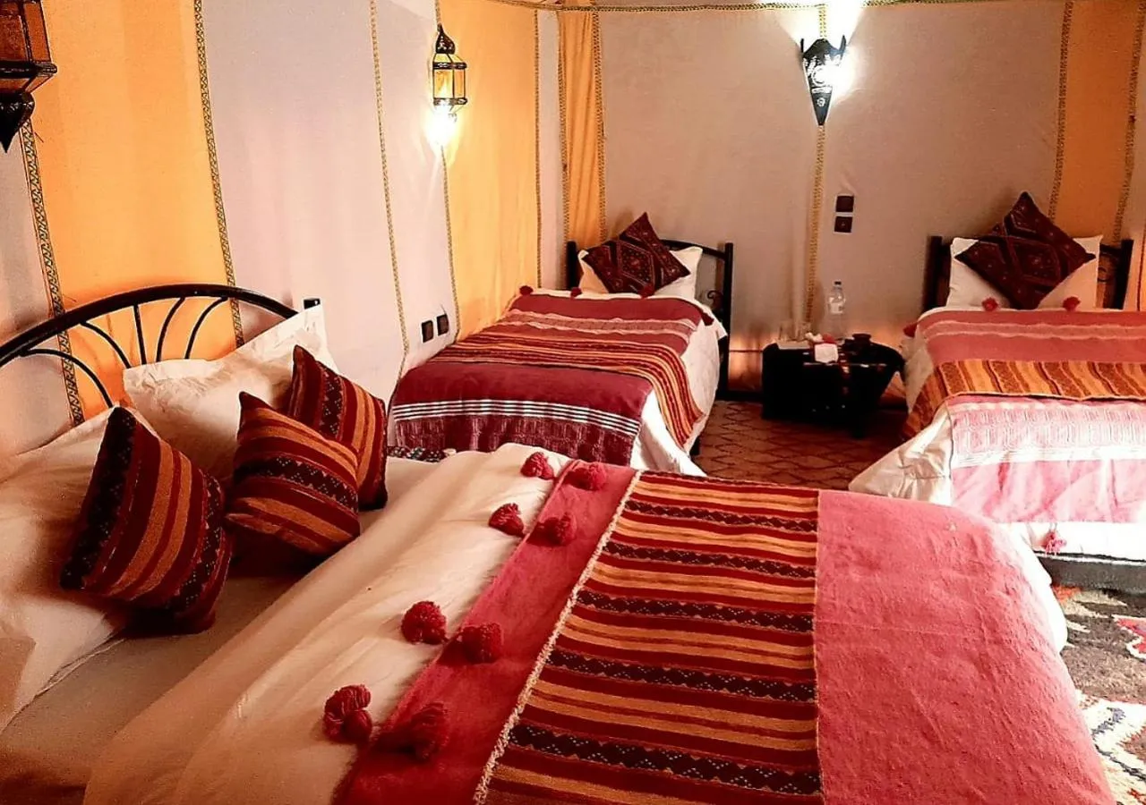 Bed in Merzouga Luxury Camp