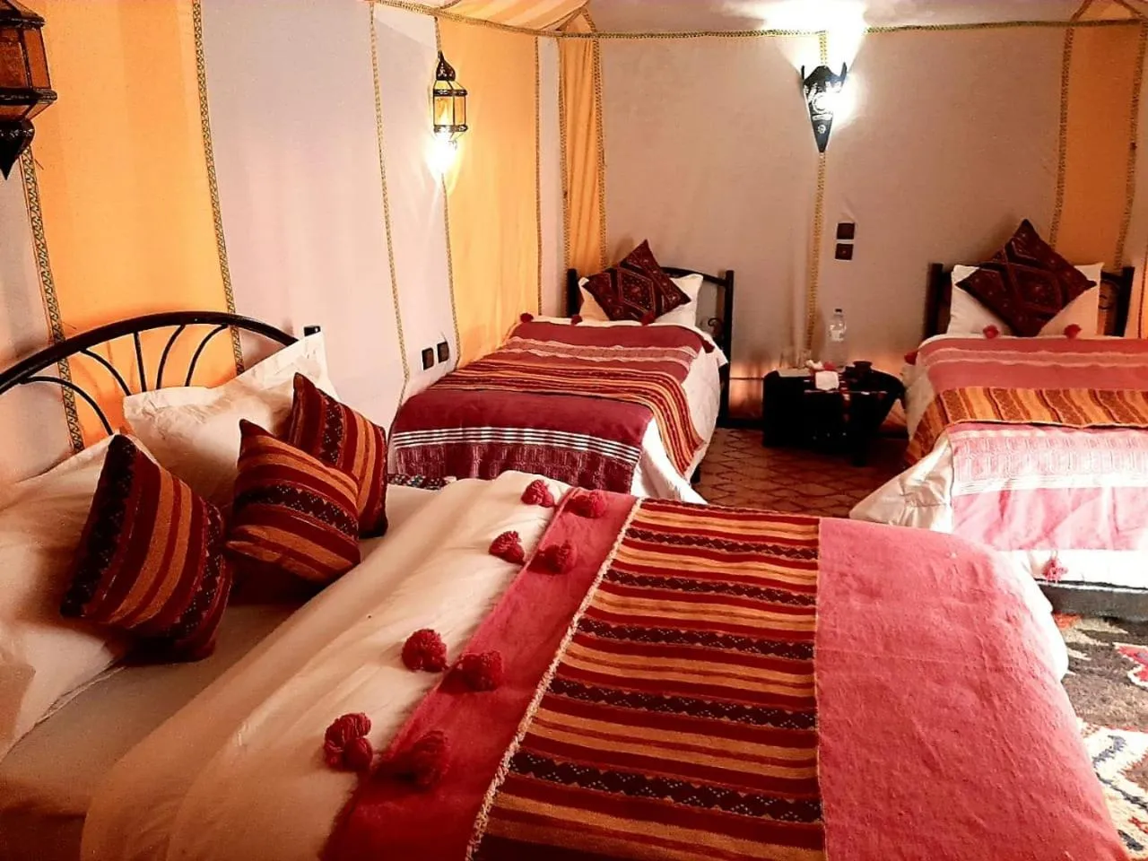 Bed in Merzouga Luxury Camp