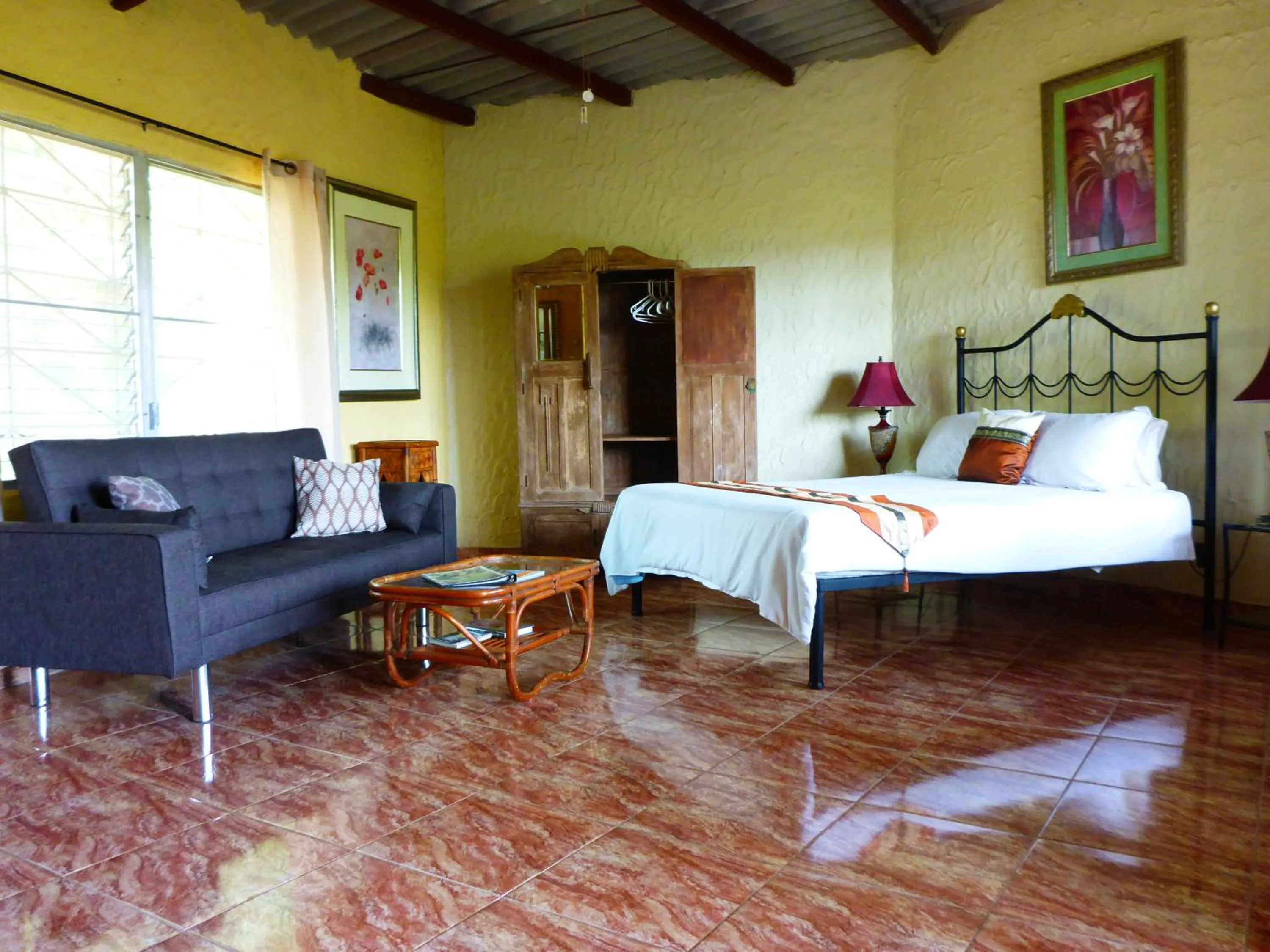 Bed in The Golden Frog Inn