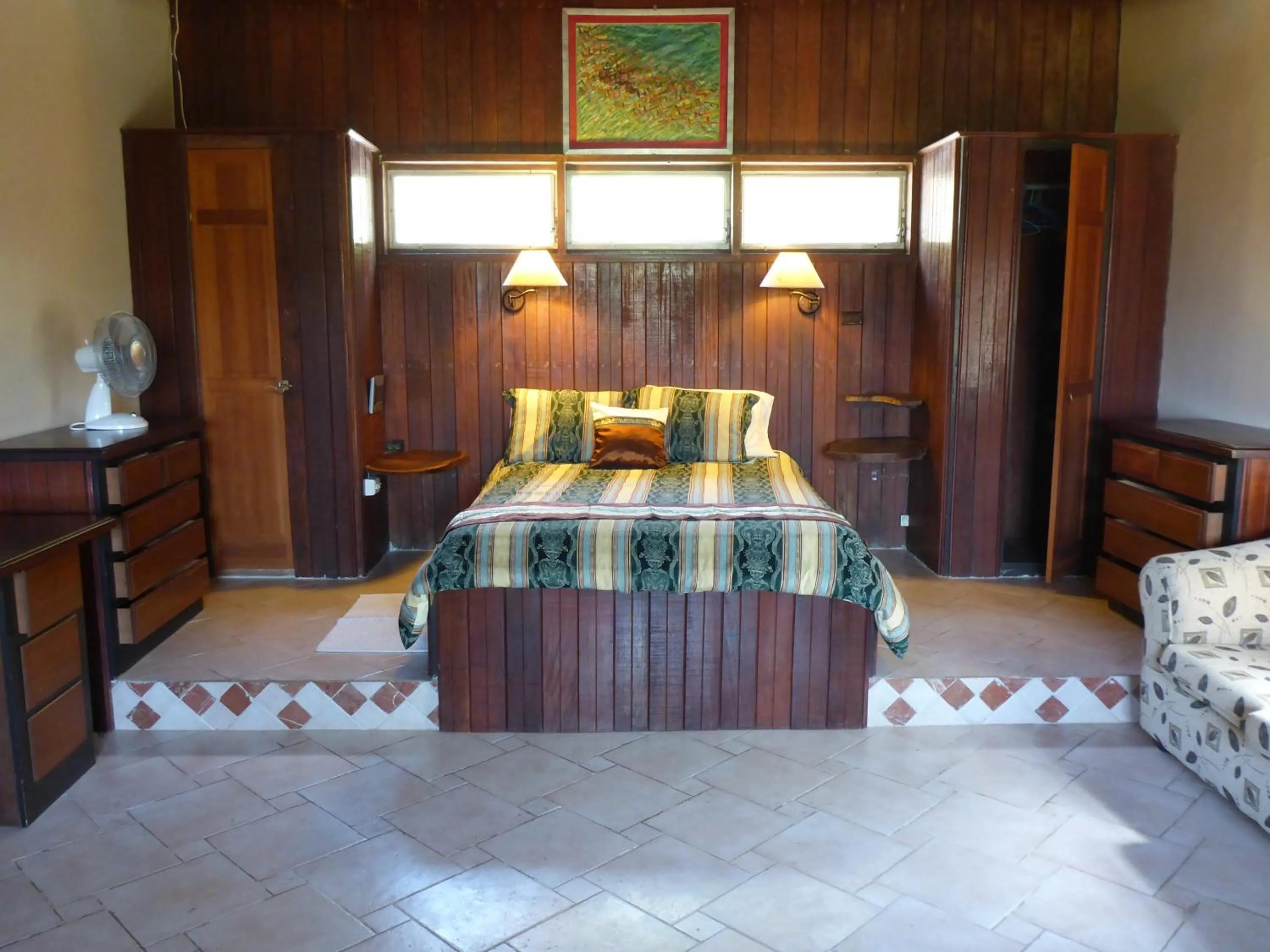 Bed in The Golden Frog Inn