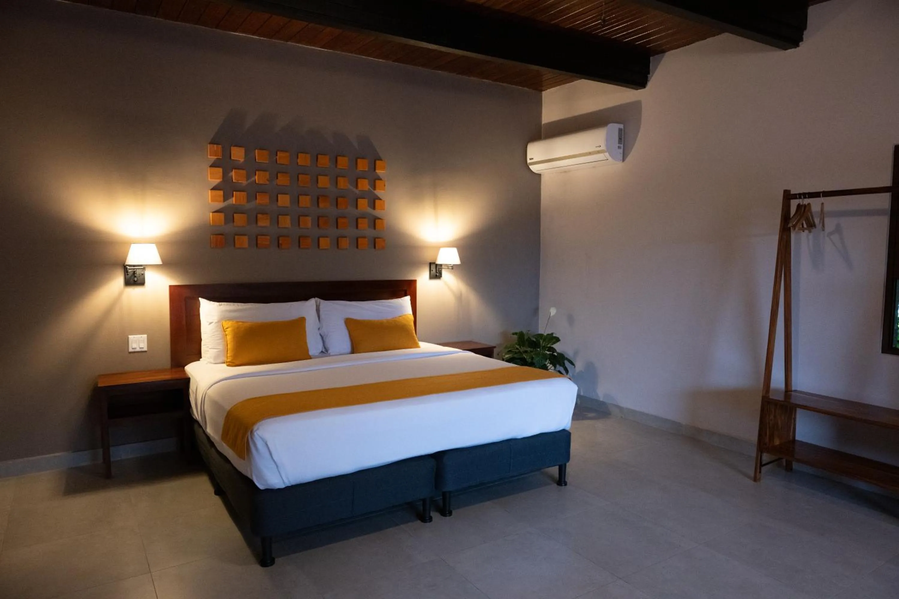 Bed in The Golden Frog Inn