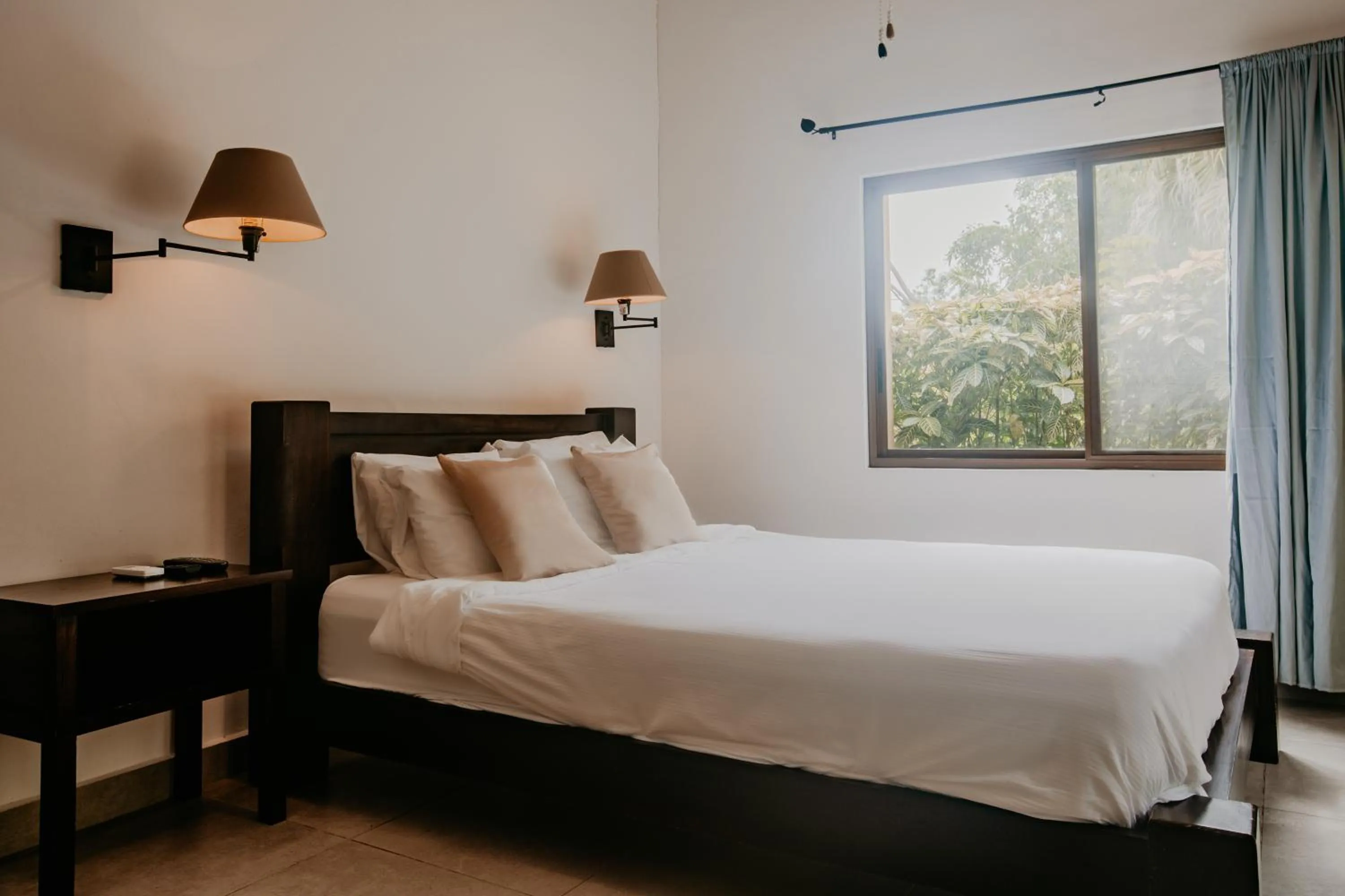 Bed in The Golden Frog Inn