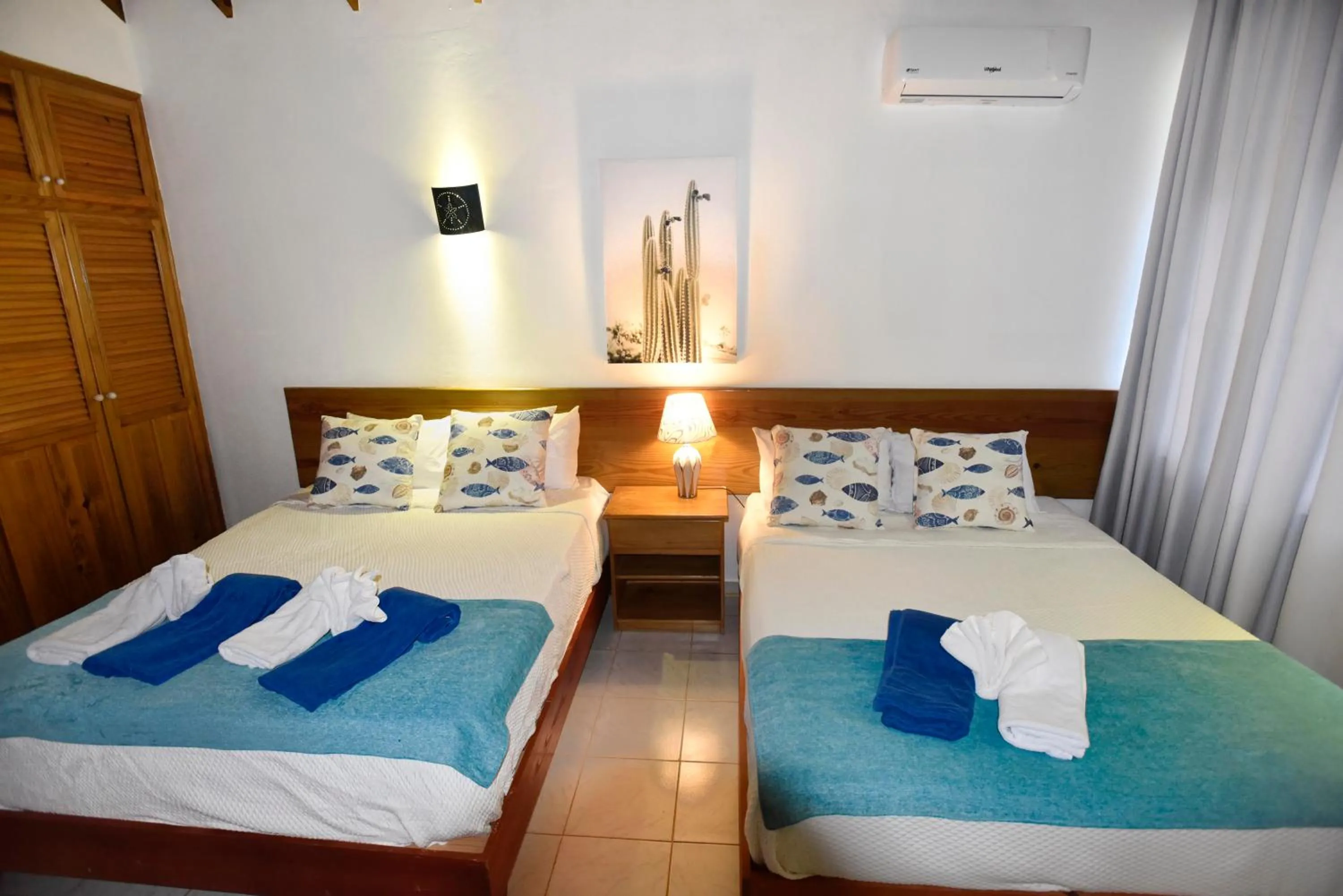 Bed in El Pelicano Apart-Hotel