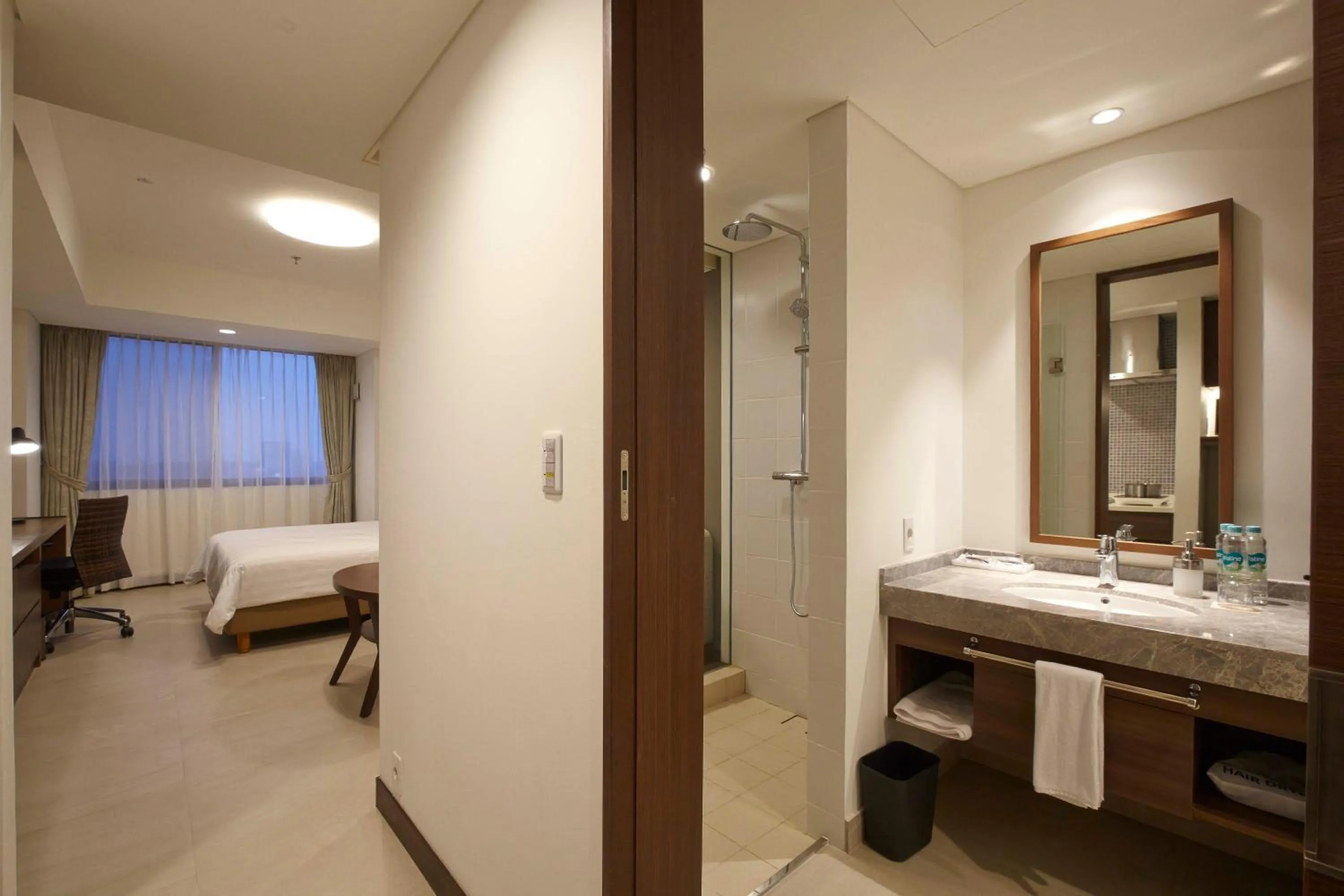 Bathroom, Bed in Axia South Cikarang Service Apartment