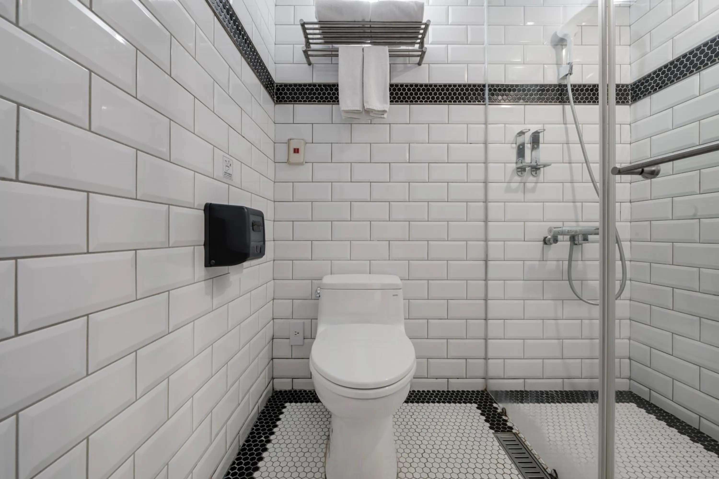 Shower in CHASE Hotel