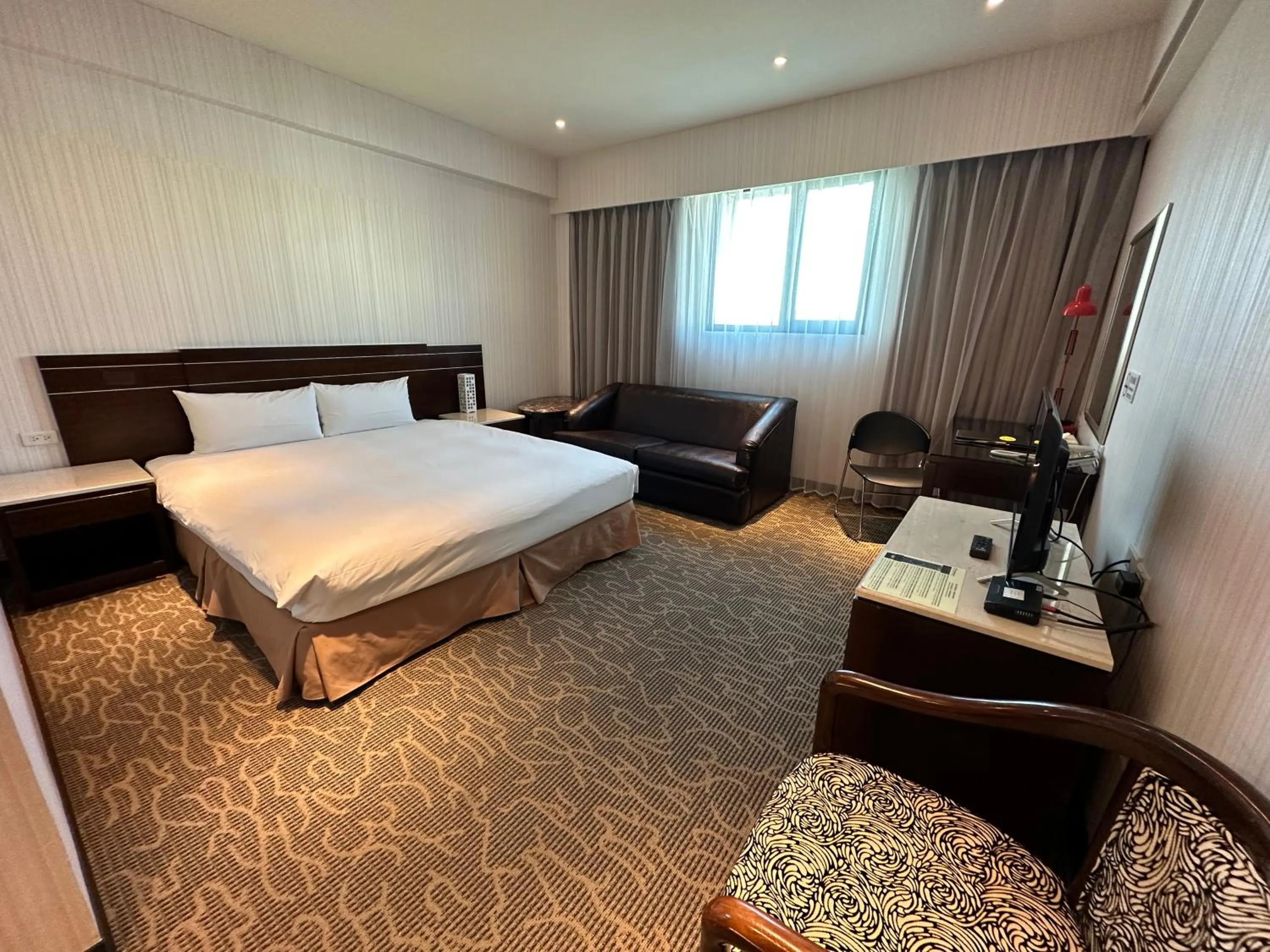 TV and multimedia, Bed in Young Soarlan Hotel - Tainan